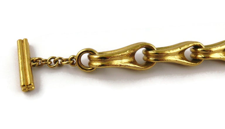 Christian Dior Boutique Vintage Gold Toned Charm Bracelet For Sale at  1stDibs