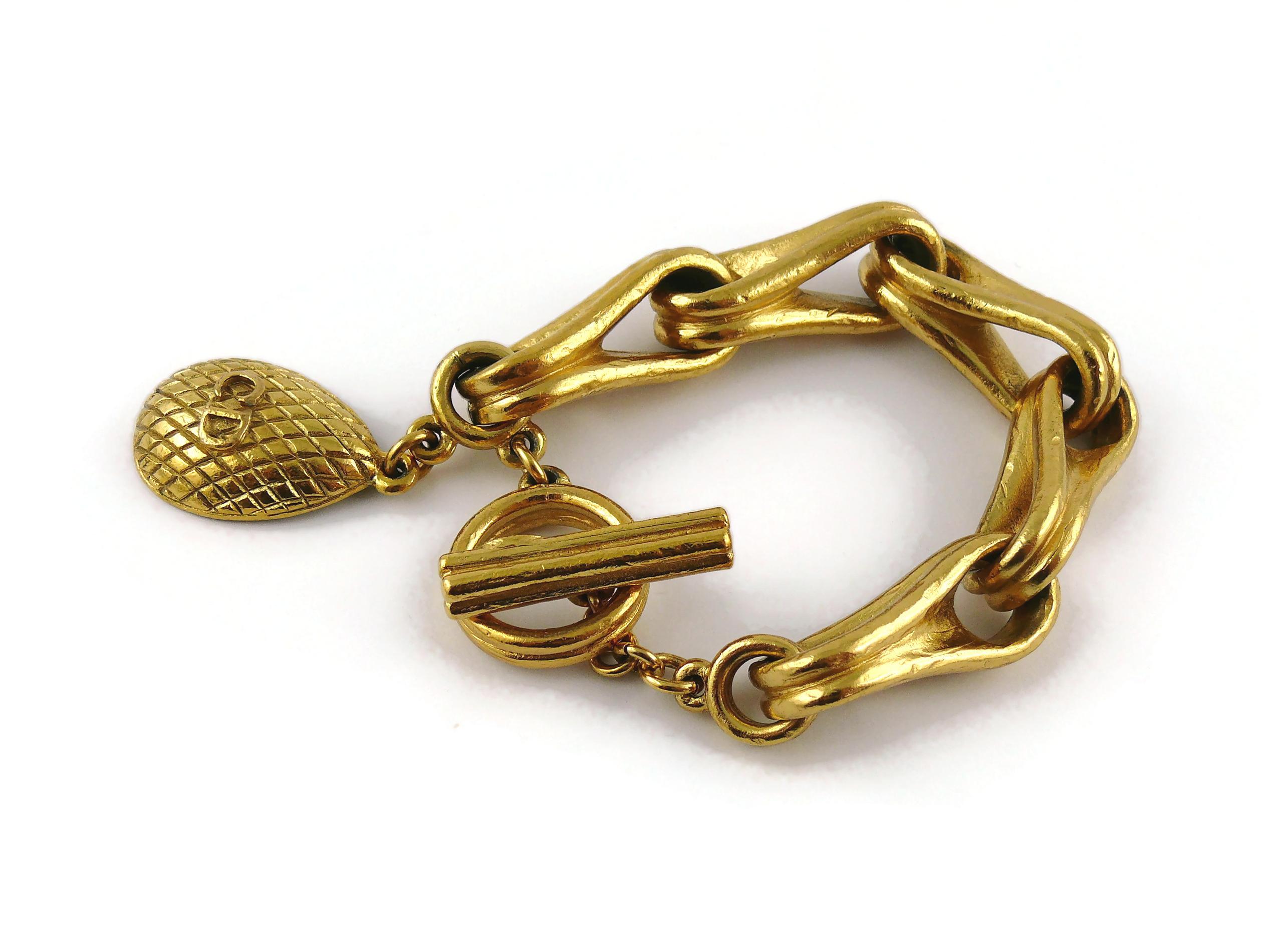 Christian Dior Boutique Vintage Gold Toned Charm Bracelet In Good Condition In Nice, FR