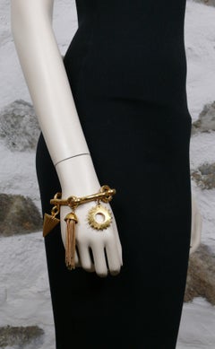 Christian Dior Boutique Pulsera vintage con colgantes dorados