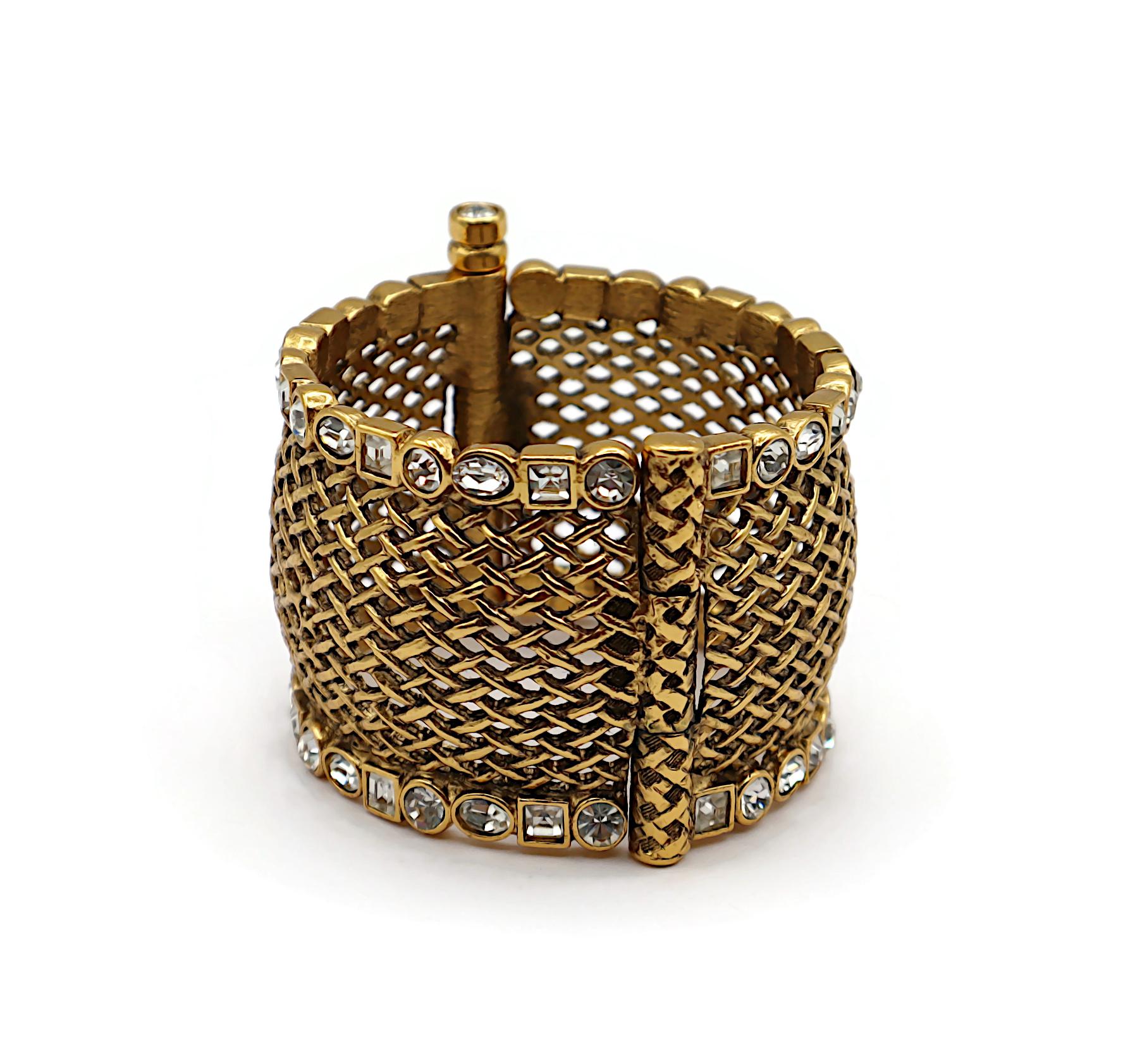 CHRISTIAN DIOR Boutique Bracciale Jewell d'epoca in tonalità oro a reticolo In condizioni buone in vendita a Nice, FR