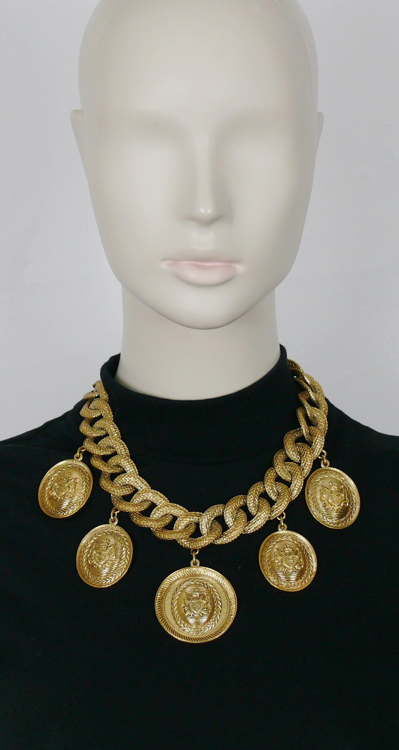 CHRISTIAN DIOR BOUTIQUE by GIANFRANCO FERRE vintage chunky textured chain necklace featuring five medallion crests.

Gold tone metal hardware.

T-bar and toggle closure.

Embossed CHRISTIAN DIOR BOUTIQUE.

Indicative measurements : length approx. 46