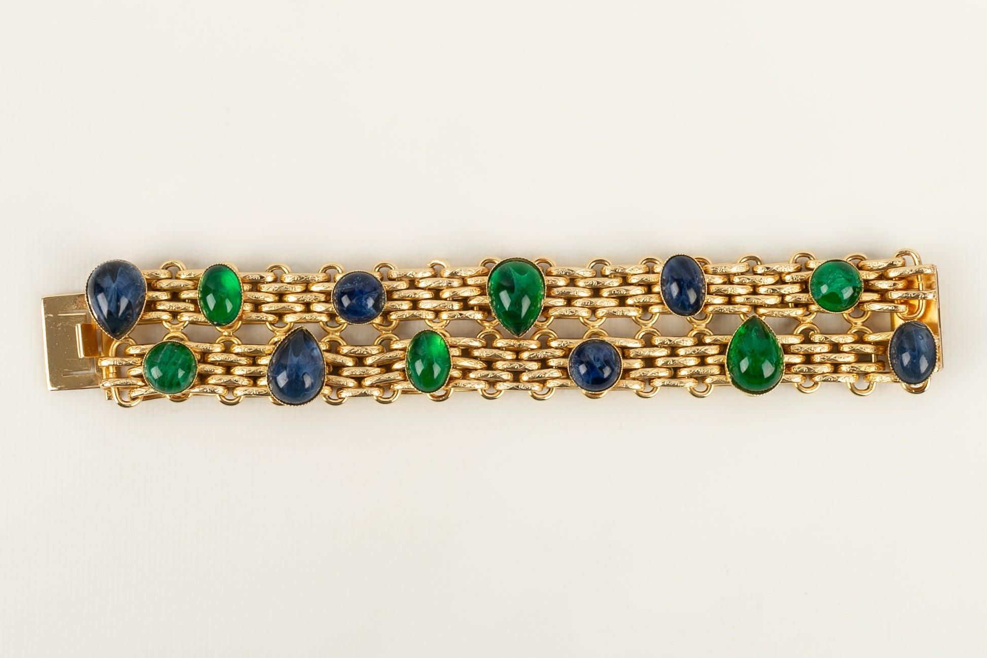 Dior - (Made in Germany) Bracelet in golden metal with cabochons in glass paste.

Additional information:
Condition: Very good condition
Dimensions: Length: 20 cm

Seller Reference: BRA179
