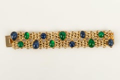 Christian Dior-Armband aus goldenem Metall mit Cabochons aus Glaspalette