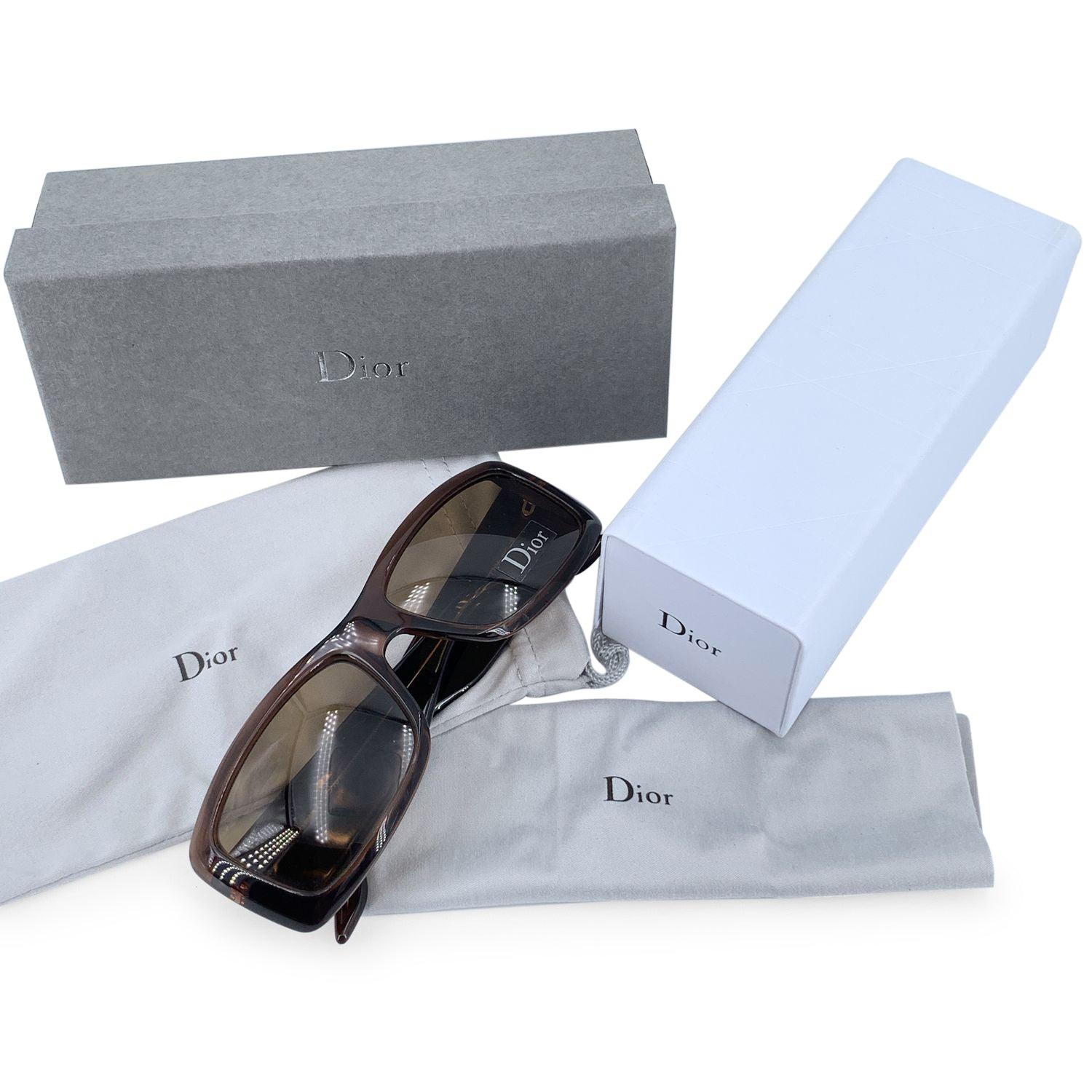 CHRISTIAN DIOR Aventura 2 Sunglasses, ANZ5V. Size 56/17 135mm. Brown acetate frame, sides with large gold metal Dior logos. 100% Total UVA/UVB protection light brown lenses. Made in Italy. Details MATERIAL: Plastic COLOR: Brown MODEL: Dior Aventura