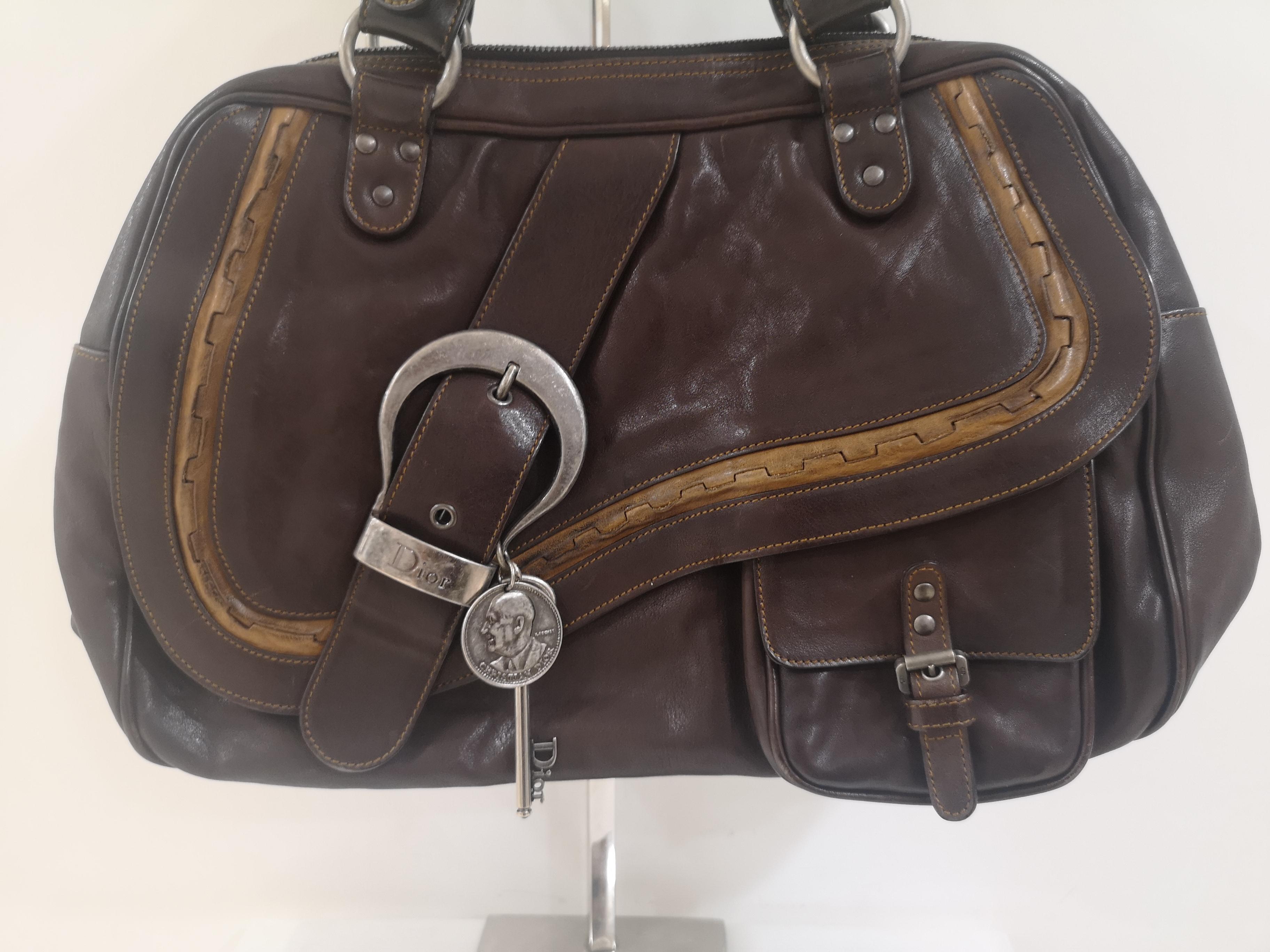 Christian Dior brown Gaucho shoulder bag
measurements: 38 * 25 cm 6 cm depth