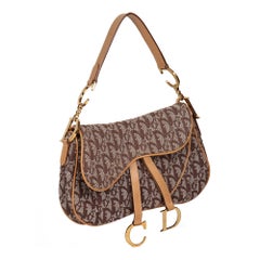 CHRISTIAN DIOR Braune Monogrammierte Canvas- und Kalbsleder-Doppel-Satteltasche