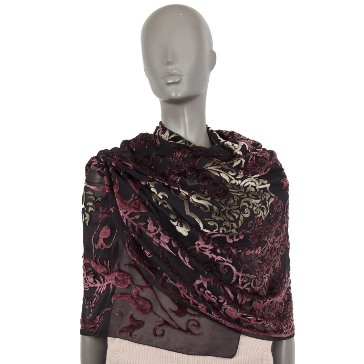 Christian Dior Devore scarf in black chiffon (viscose (82%) and silk (18%) with burgundy and pale olive velvet pattern. Has been worn and is in excellent condition.

Width 65cm (25.4in)
Length 175cm (68.3in)
