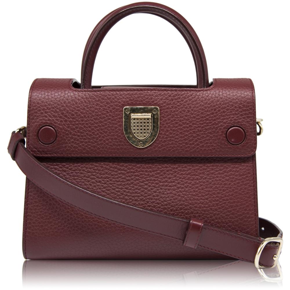 Elegantly structured to perfection from the smoothest calfskin leather in a deep burgundy, this Diorever bag, the symbol of Couture elegance and refinement is suffused with cutting-edge urban attitude. Instantly recognisable by its iconic
