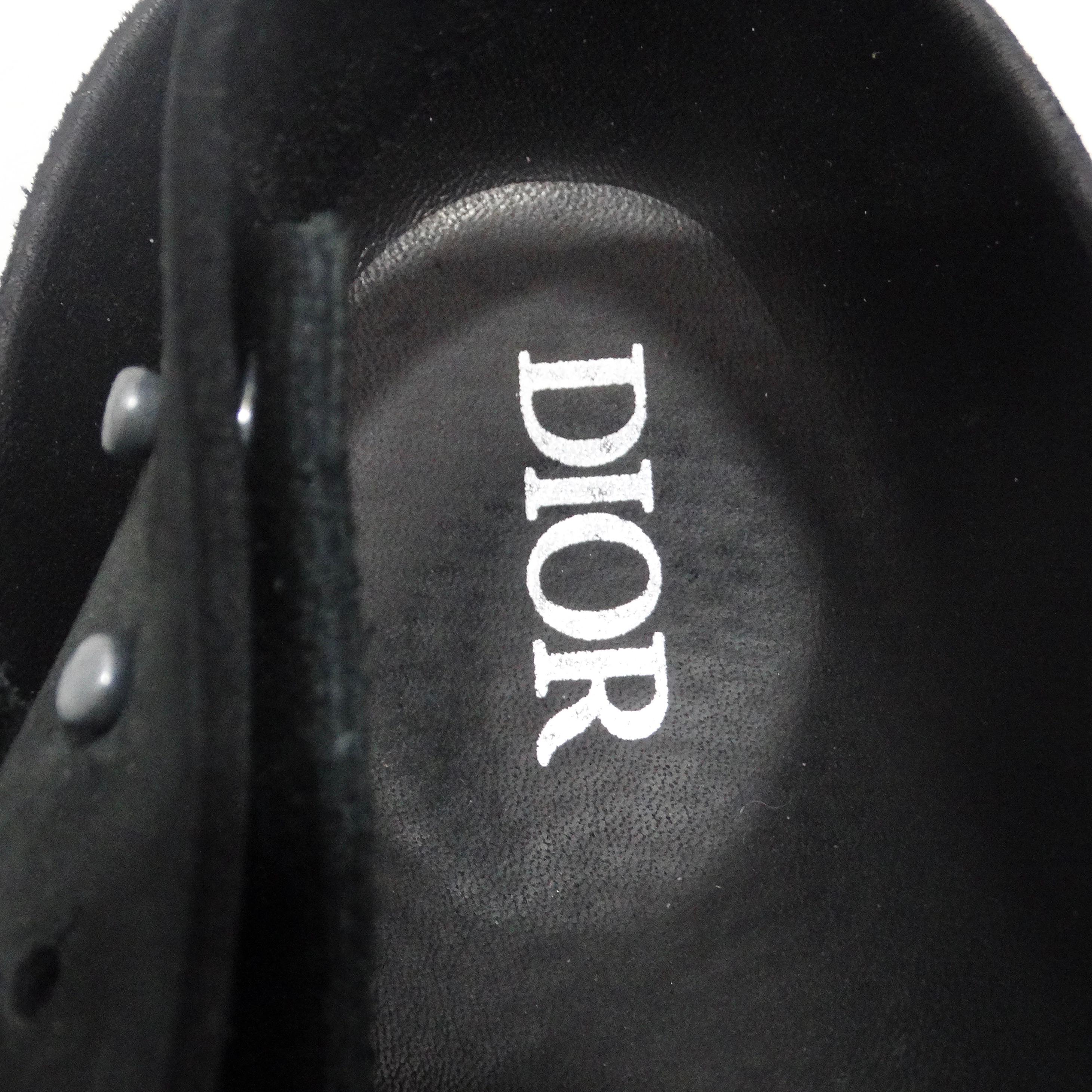 Introducing the Christian Dior By Birkenstock Tokio Mule in Black – a revolutionary collaboration that combines the iconic Dior aesthetic with the renowned comfort of Birkenstock. These mules are not just a pair of shoes; they represent a meeting of