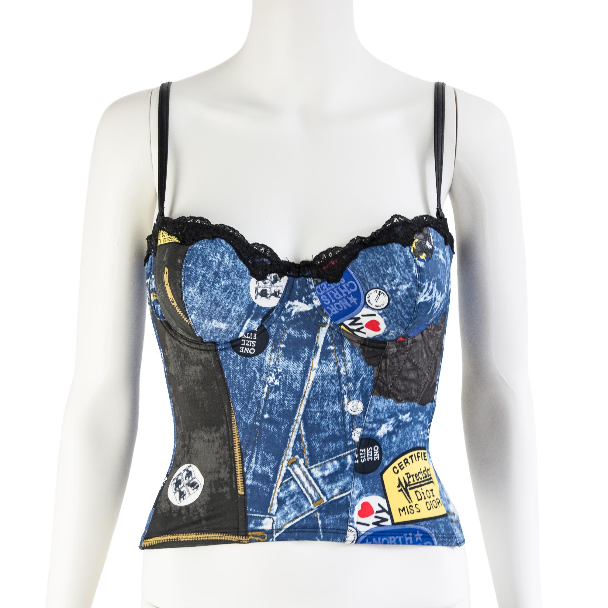 Ruder Than The Rest presents a Christian Dior autumn-winter 2001 denim Trompe L'oeil print bustier.

Designed by John Galliano for the Miss Diorella collection.

All over denim 'Trompe L'oeil' print where no two pieces are the same.

A few quirky