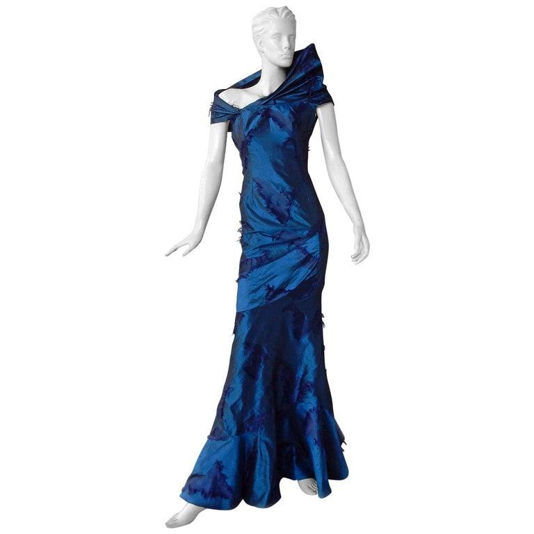 A rare Christian Dior by John Galliano f/w 1999 sapphire blue eyelash silk bias cut gown.  Designed with the utmost attention to couture detailing and sophisticated construction.  Gown is created with  impressive sculptural details such as the