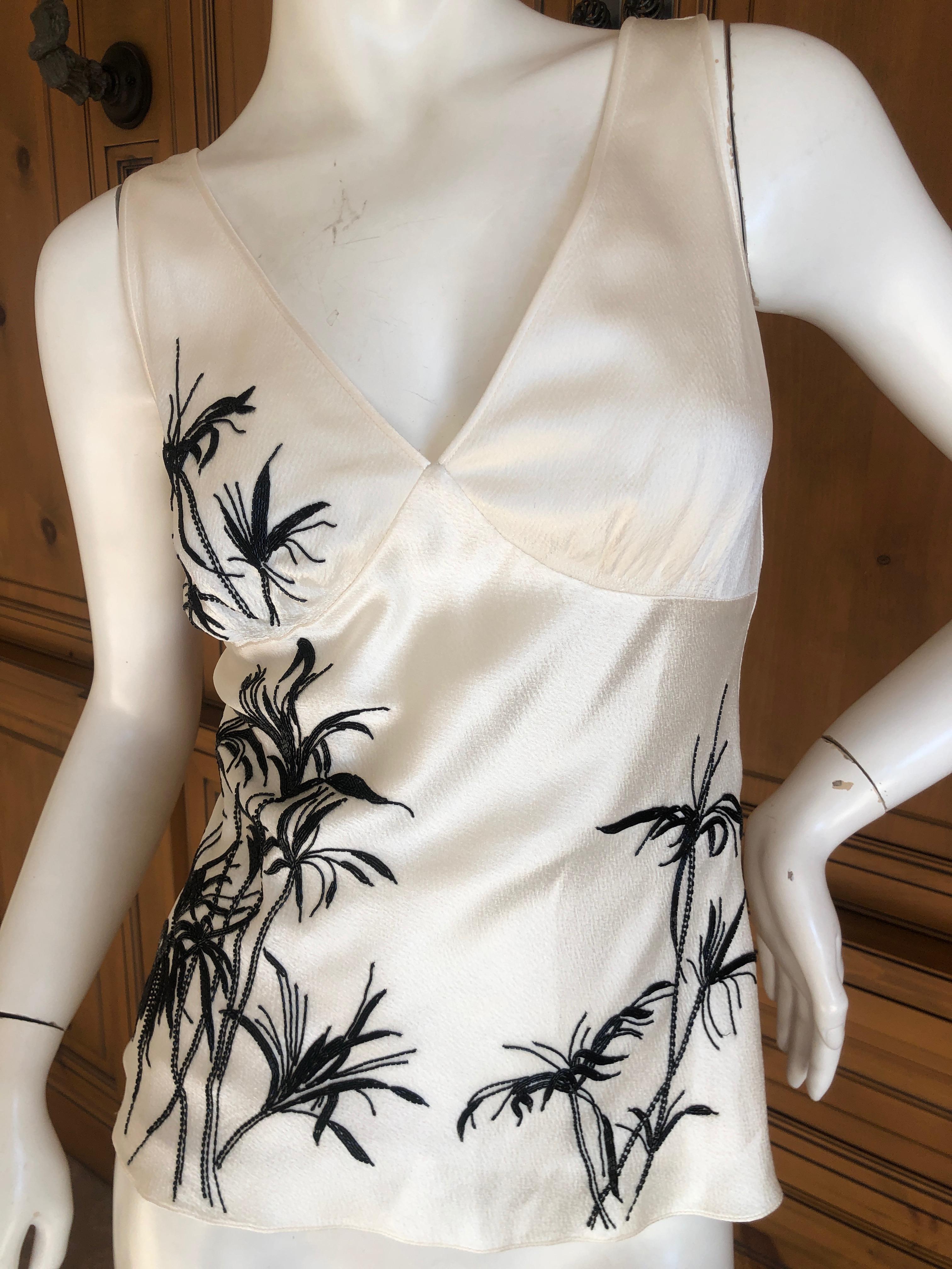 Wonderful Christian Dior by Gianfranco Ferre 1994 Hammered Silk Top with Lesage Floral Beading
So beautiful, the beads are tiny black bugle beads
SIze 36
Bust 36