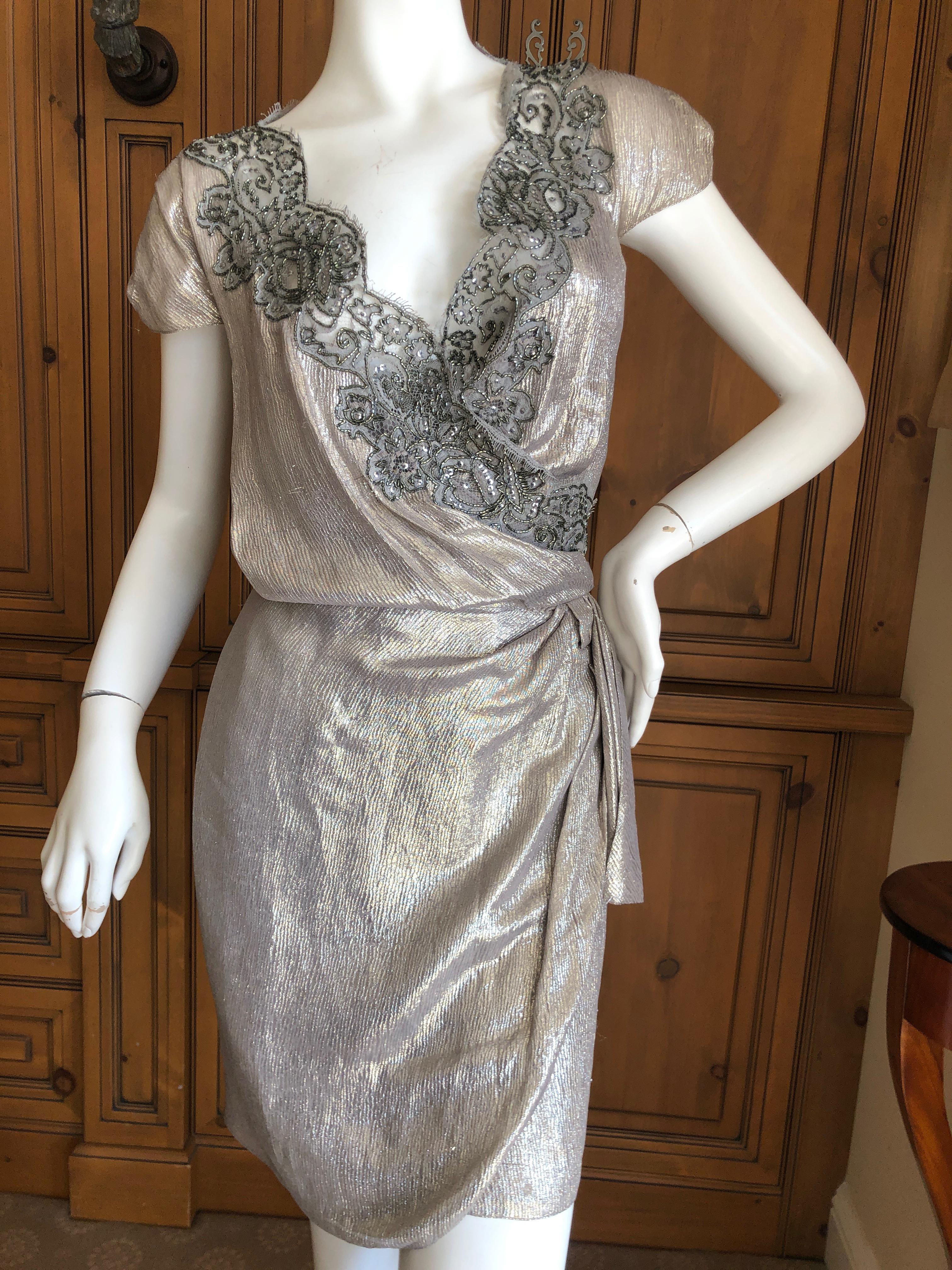  Christian Dior by Gianfranco Ferre Bead Embellished Metallic Wrap Dress 
This is so pretty, please use the zoom to see the details.
There are both silver and gold threads in the fabric
Size 40
 Bust 38