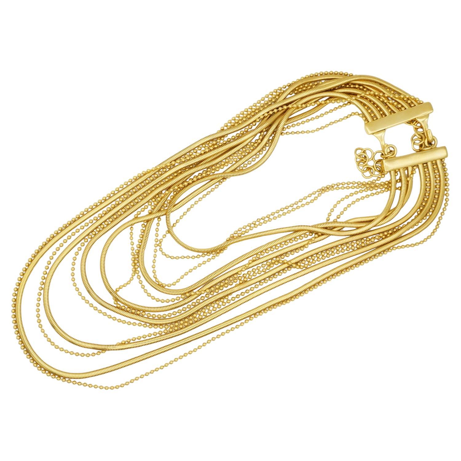 Christian Dior by John Galliano 1990 Masai Vintage Unisex 13 Strands Layer Bead Coil Chunky Statement Tassel Long Necklace, Gold Tone

Très bon état. 100% authentique. Très rare à trouver.

Marqué 
