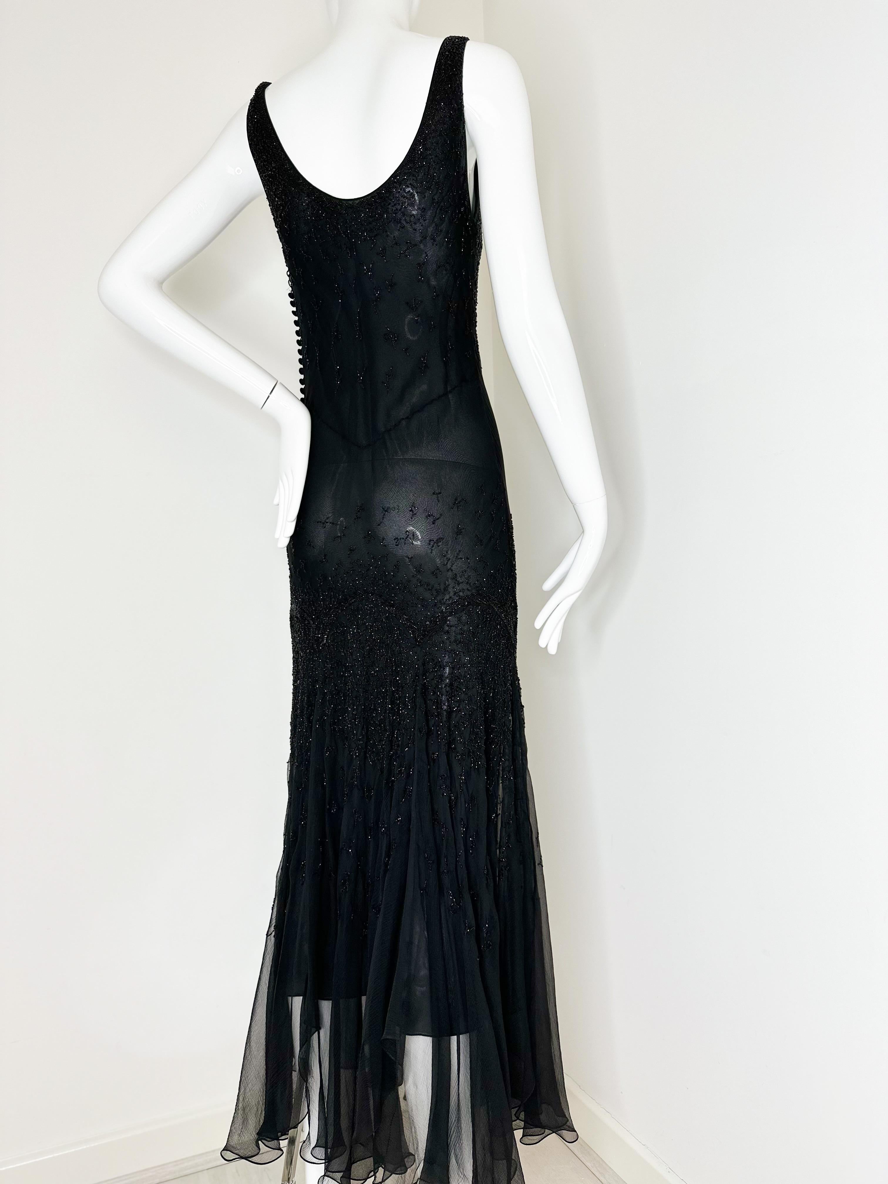 Christian Dior by John Galliano 2002 black silk beaded gown dress 
Collector’s item!

Size FR40
Stunning biased cut chiffon silk that flows with your every movement!
Good vintage condition: two buttons missing on the side. Small tear underarm on the