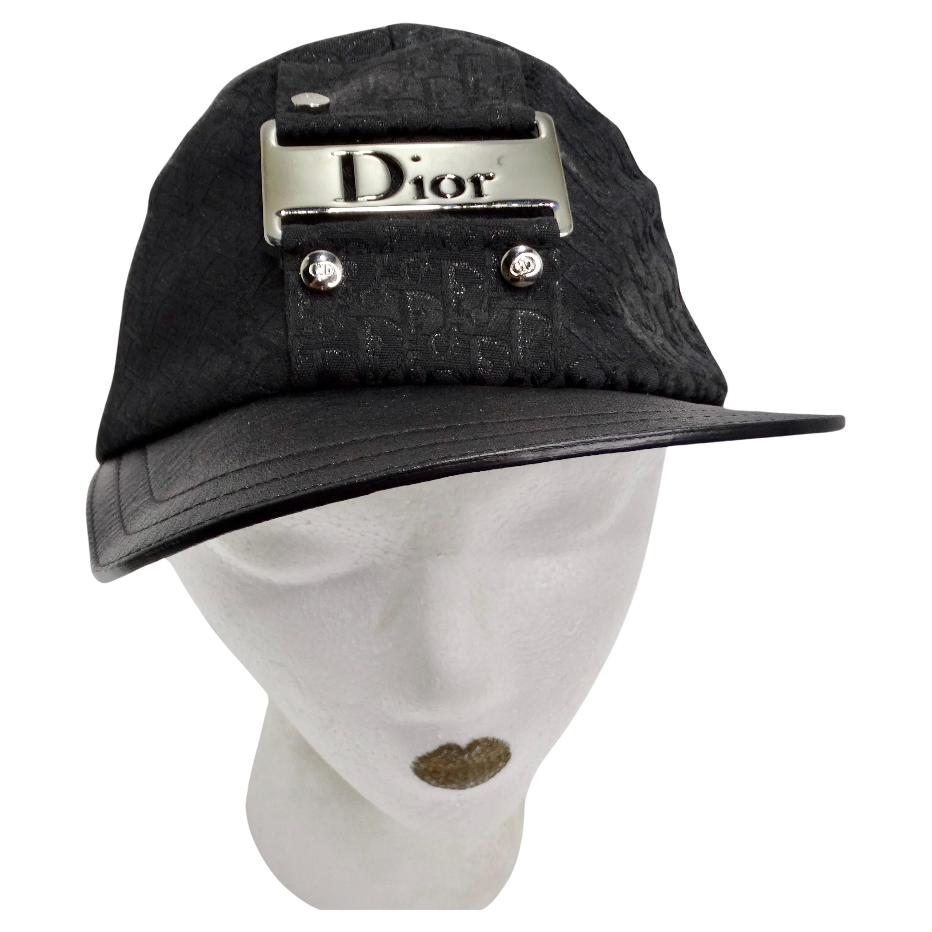 Introducing the Christian Dior by John Galliano 2002 Trotter Monogram Baseball Cap, a timeless and iconic accessory that epitomizes luxury and style. Crafted with the signature Dior trotter monogram in black canvas, this baseball-style hat exudes