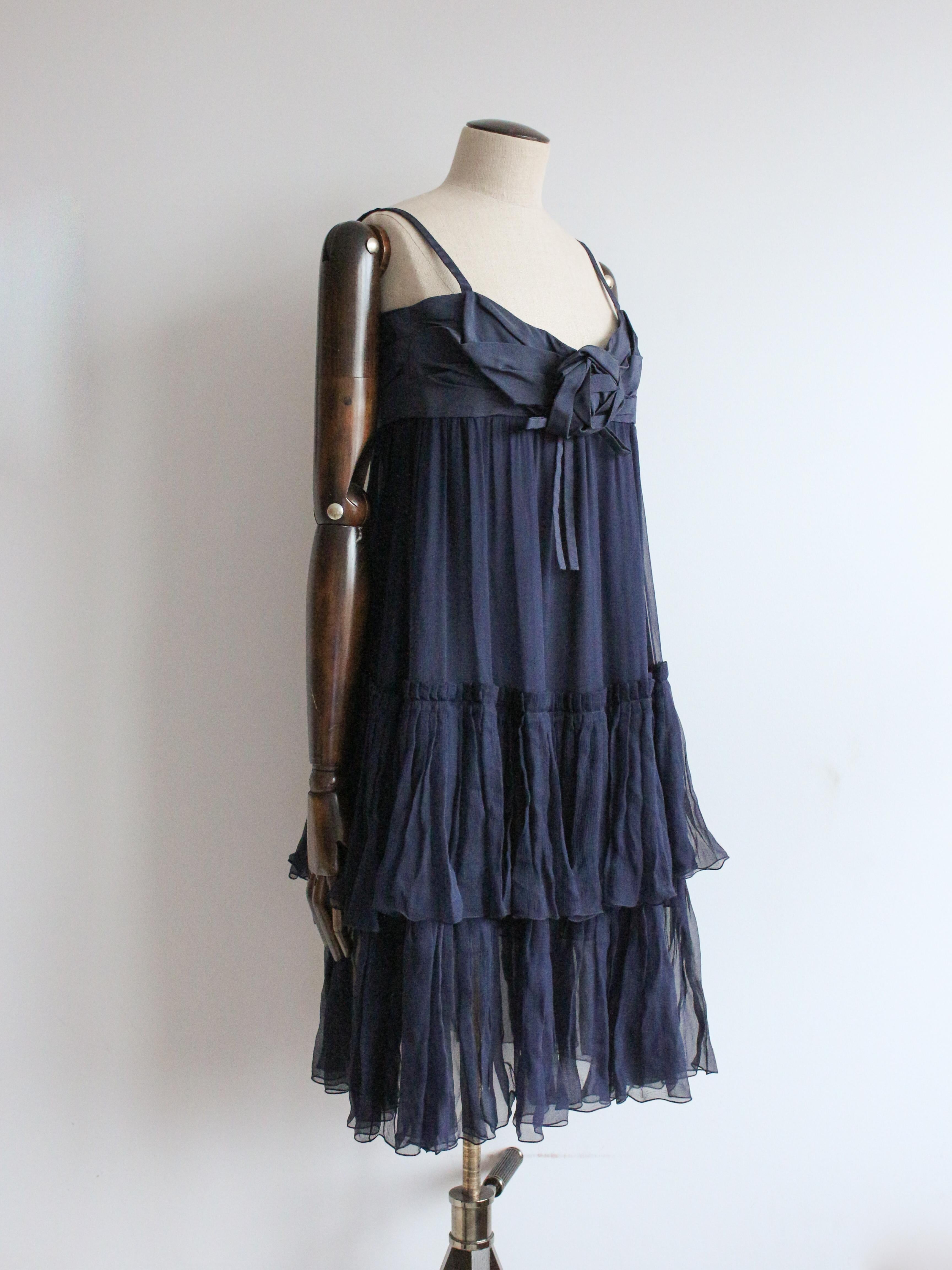 Christian Dior Autumn/Winter 2008 navy silk chiffon babydoll dress with pleated rosette.

Tagged size FR34.

In excellent condition.