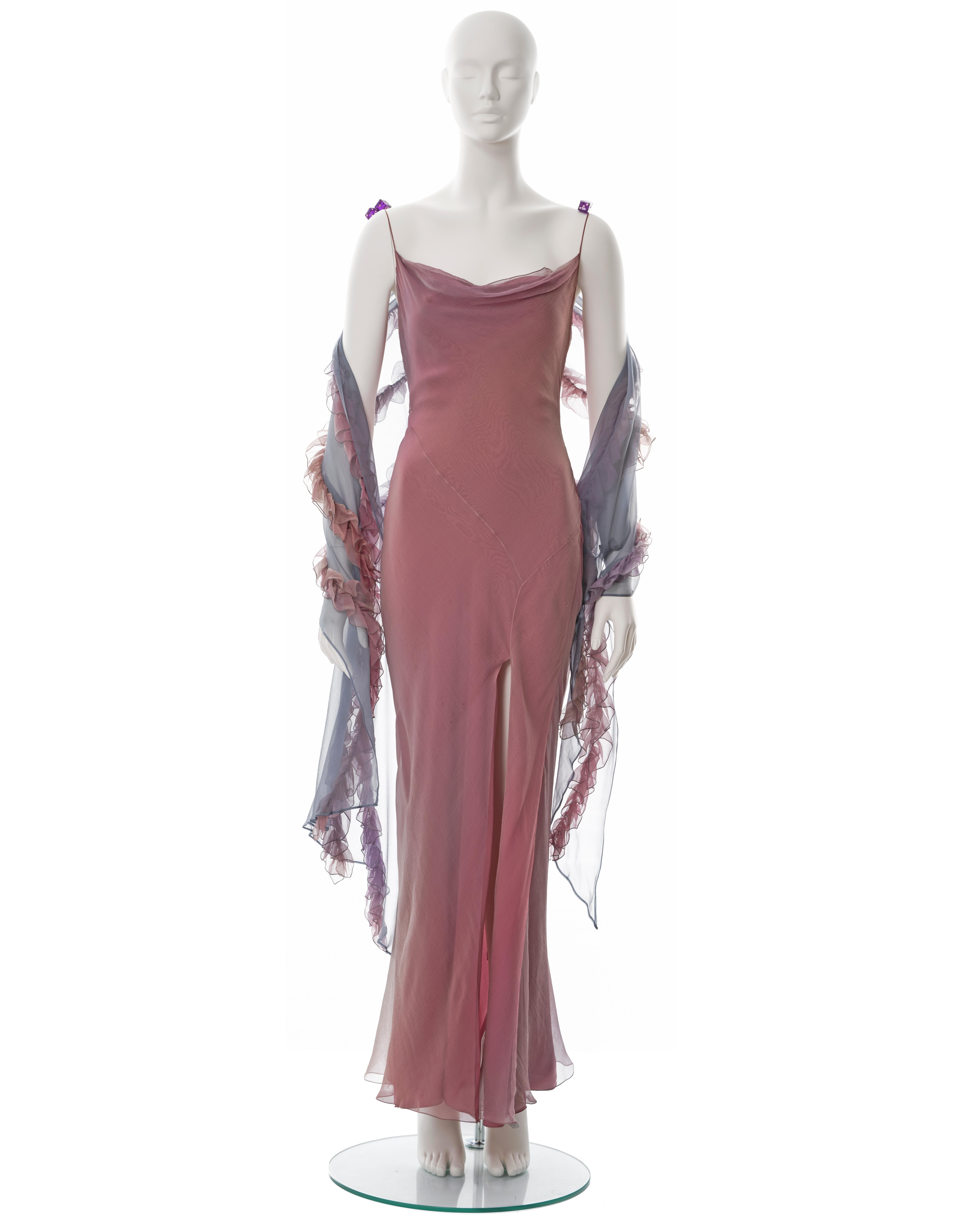 ▪ Christian Dior bias cut silk evening dress with shawl
▪ Designed by John Galliano
▪ Sold by One of a Kind Archive
▪ Fall-Winter 2004
▪ Crinkled silk chiffon in a pink and purple ombre 
▪ Double-layered
▪ Cowl neck 
▪ High leg slit 
▪ Purple dice