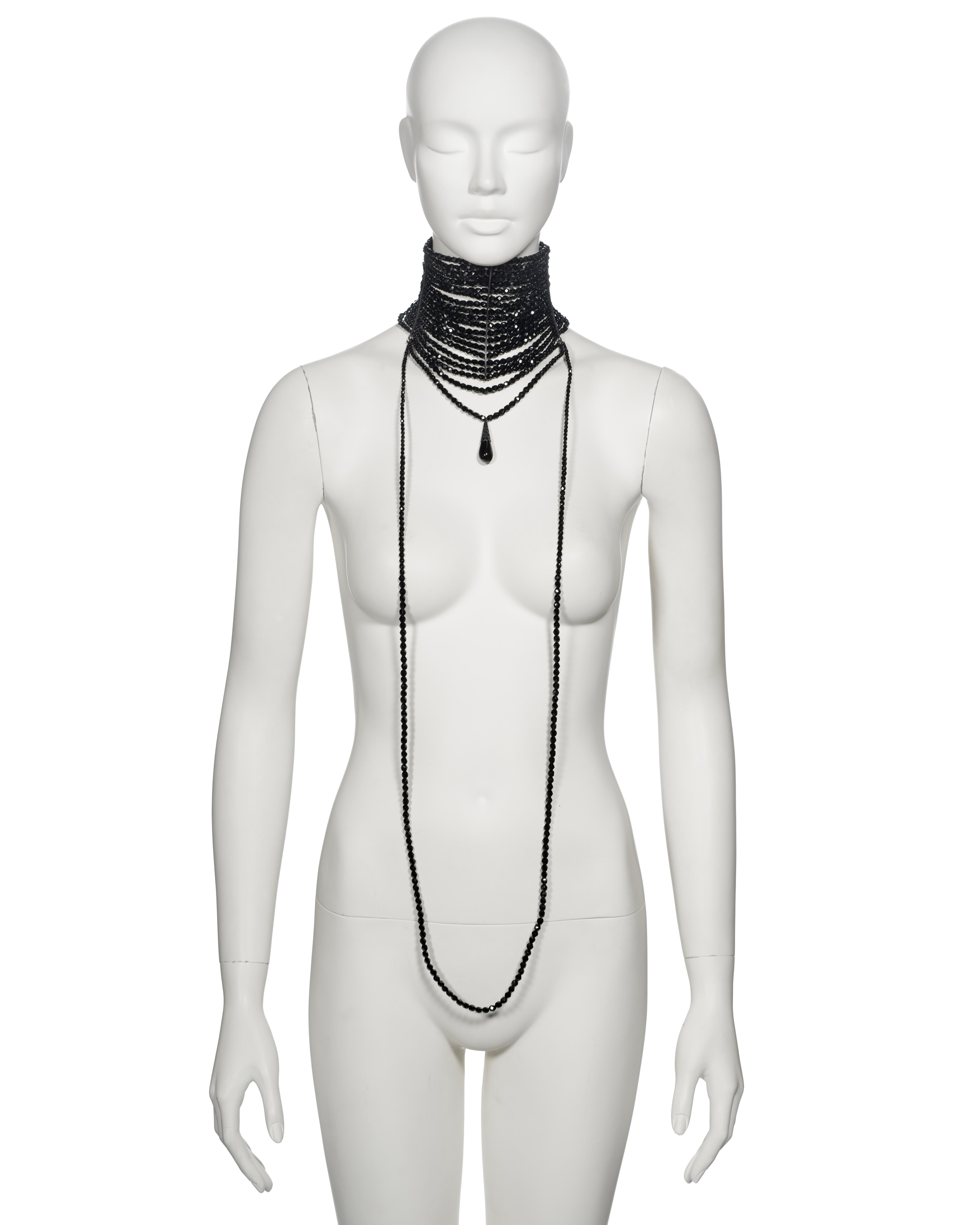 ▪  Archival Christian Dior Choker Necklace
▪ Creative Director: John Galliano
▪ Spring-Summer 1999
▪ Sold by One of a Kind Archive
▪ Made in France   
▪ Black faceted beads
▪ Black metal hardware
▪ 18 strands around the neck
▪ 2 additional strands