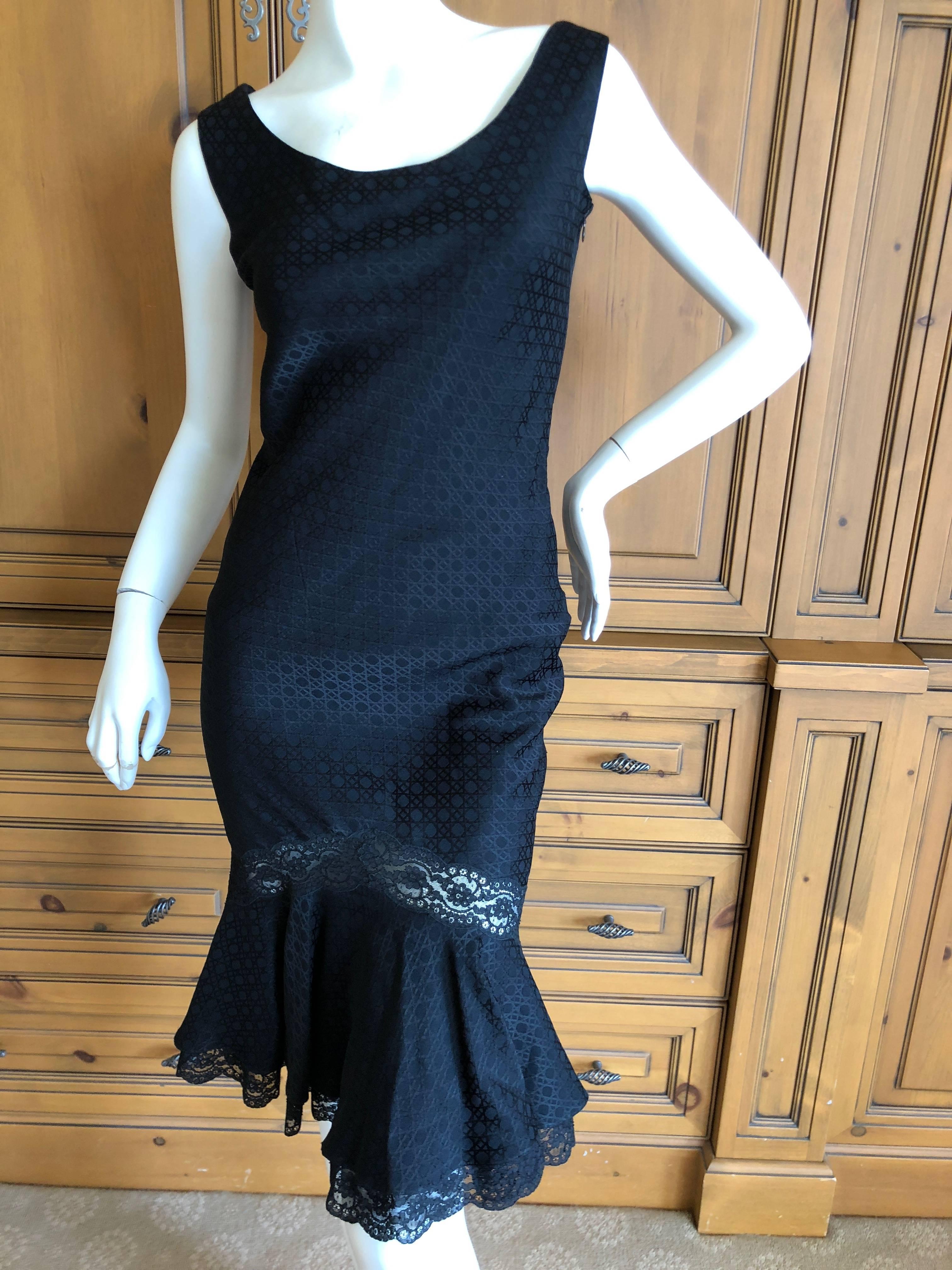 Christian Dior by John Galliano Black Cannage Pattern Silk Lace Trim Dress .
Cut on a bias, there is room in the measurements, it will stretch.
The Cannage pattern , a Dior signature is very subtle , black on black and very chic.
I have never seen