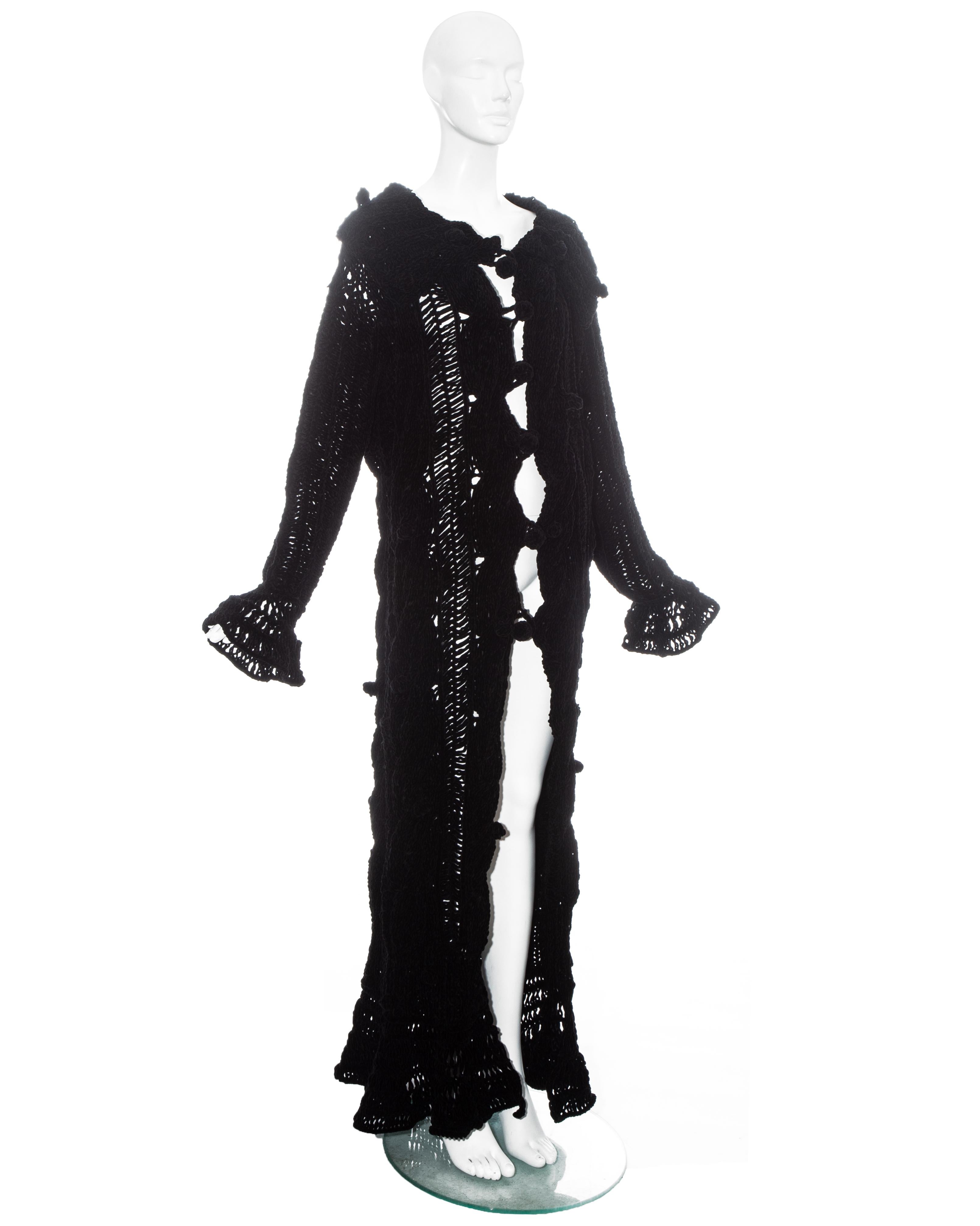 Christian Dior by John Galliano:  black crochet velvet oversized cardigan with large collar and flared cuffs.

Fall-Winter 2004