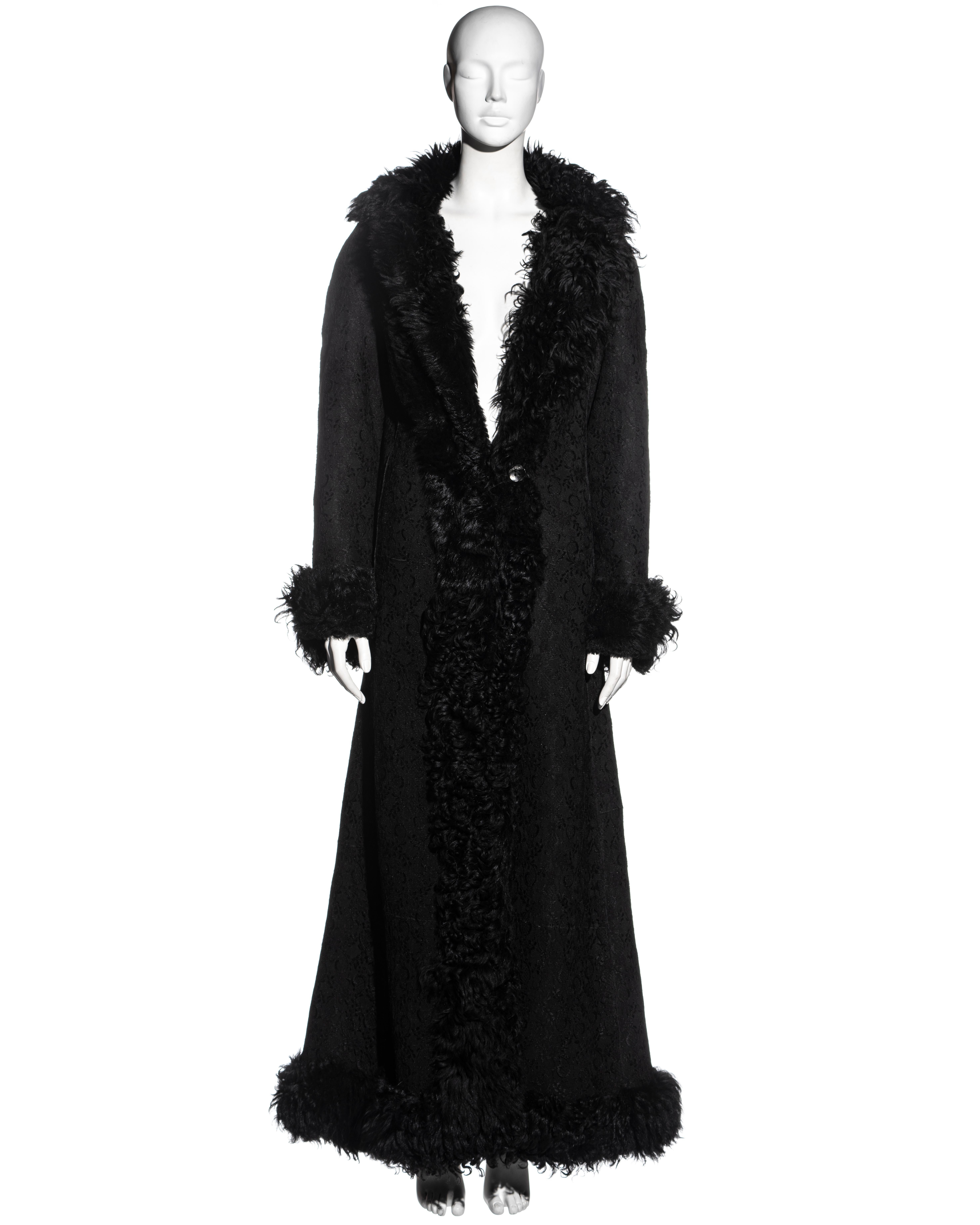 ▪ Christian Dior black full-length coat 
▪ Designed by John Galliano
▪ Mongolian lamb with lace overlay 
▪ Heavyweight
▪ Large button fastening at the waist 
▪ 100% lamb, lace - 100% Nylon
▪ FR 40 - UK 12 - US 8
▪ Fall-Winter 2001