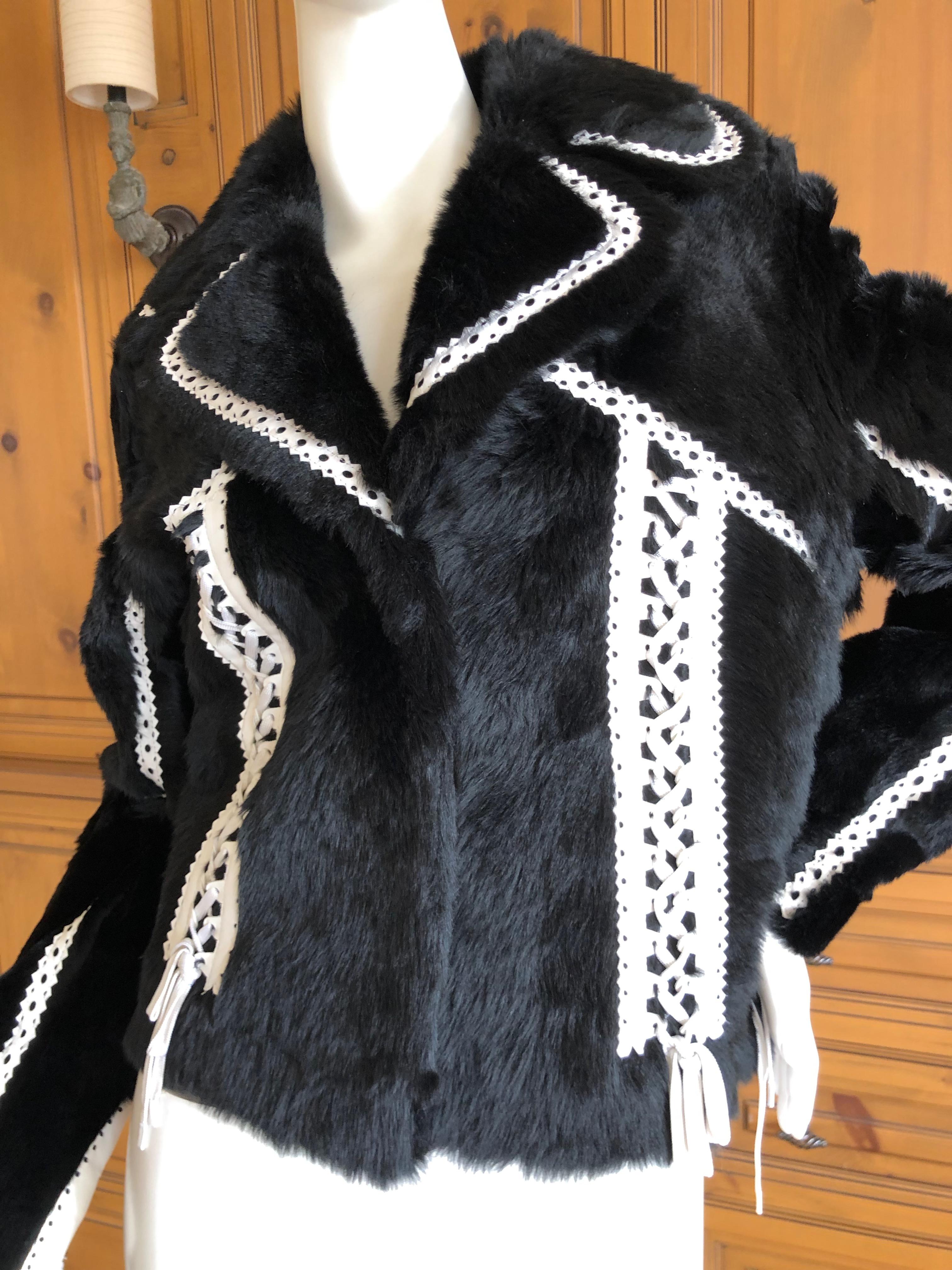 Christian Dior by John Galliano Black Fur Moto Jacket White Leather Lace Up Trim.
This is so wonderful, inside is leather, outside is black fur.
WHite leather trim with corset lacing.
Size 38
Bust 40
