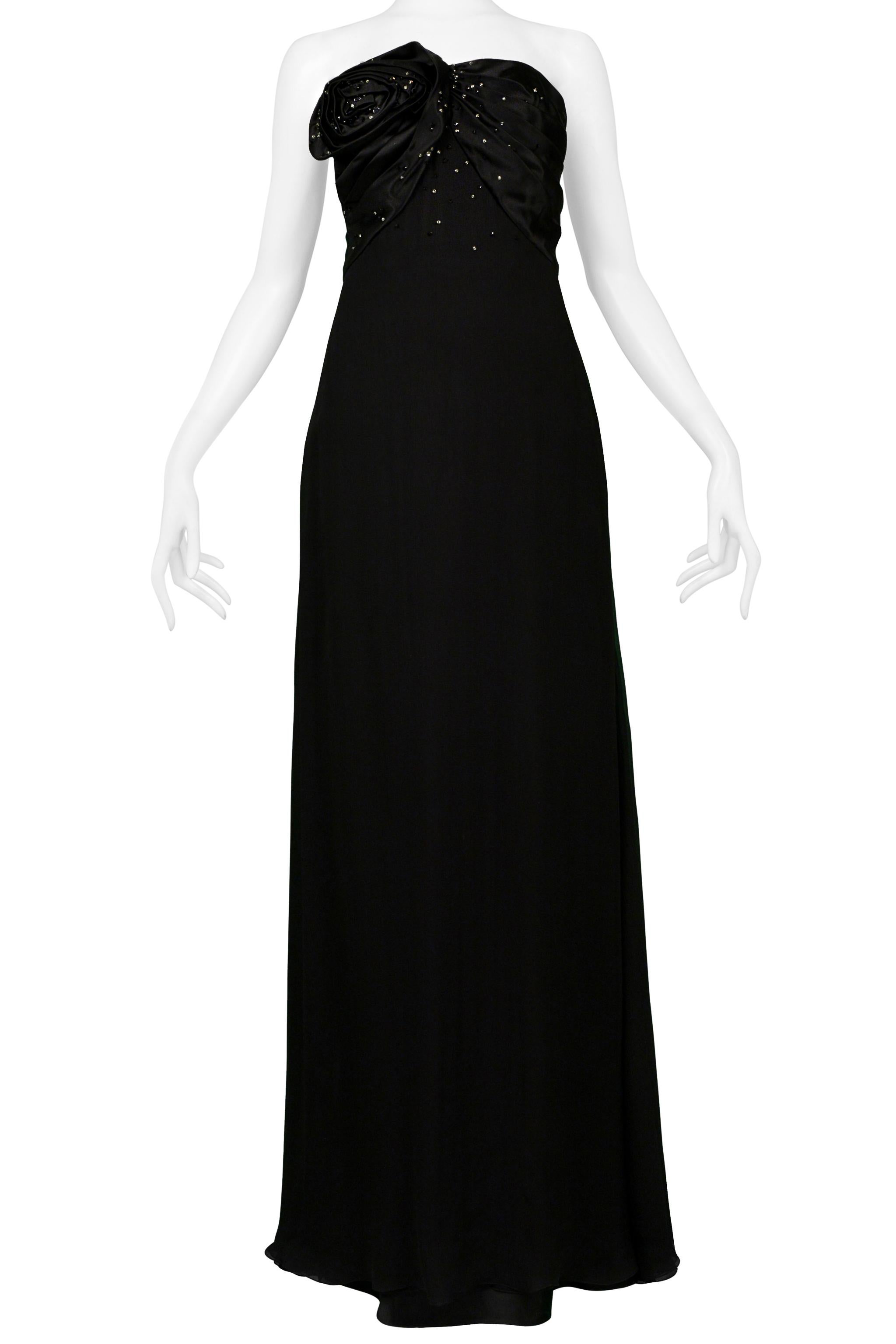 Resurrection Vintage is excited to offer a stunning vintage Christian Dior by John Galliano evening gown featuring a heavily rhinestoned bodice, rosette applique, can be worn with straps or without, and floor length.

Christian Dior by John