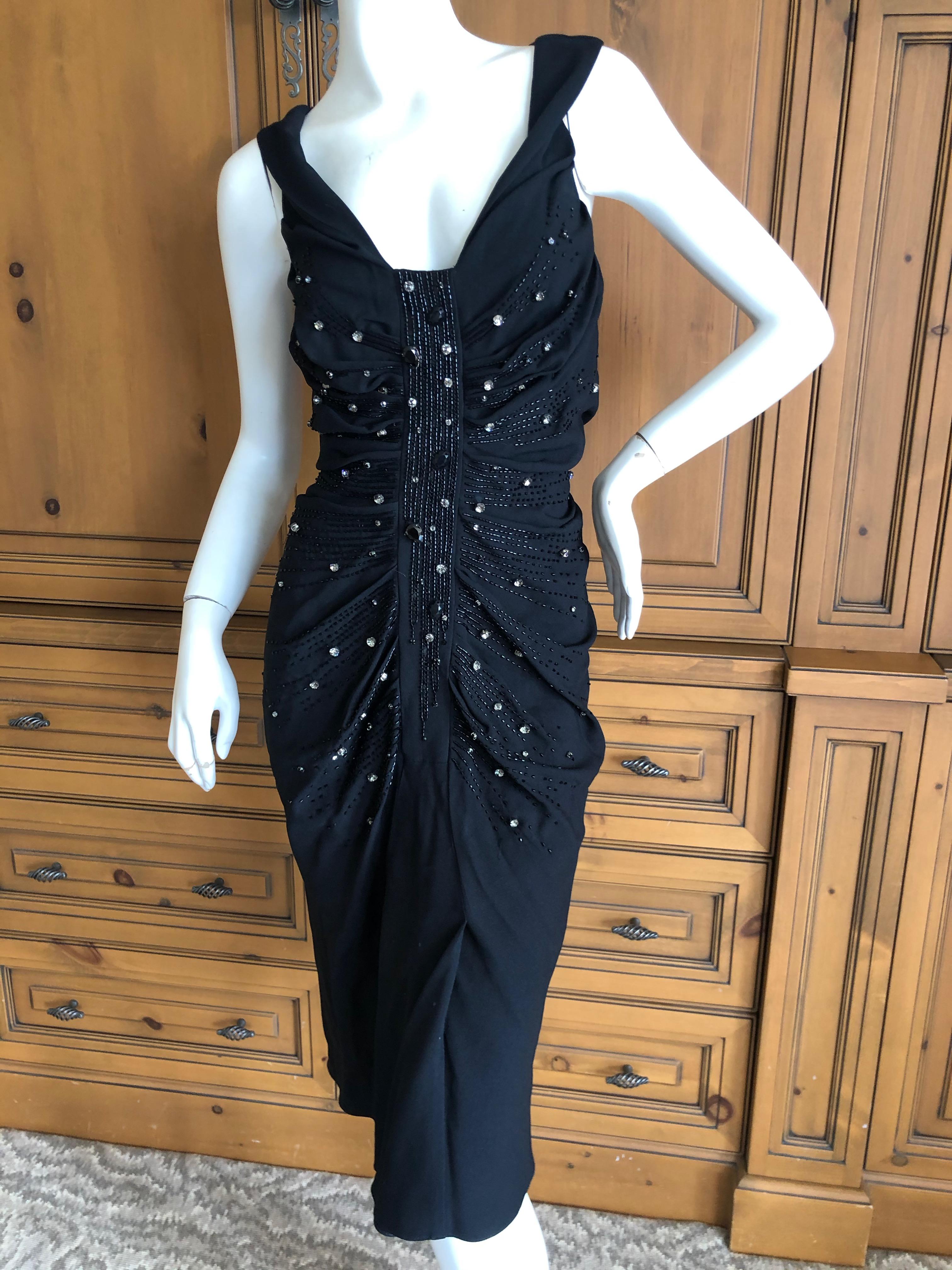 Christian Dior by John Galliano Black Cocktail Dress with Jewel Embellishments.
Please use the zoom feature to see the beautiful details.
 Size 40
 Bust 36