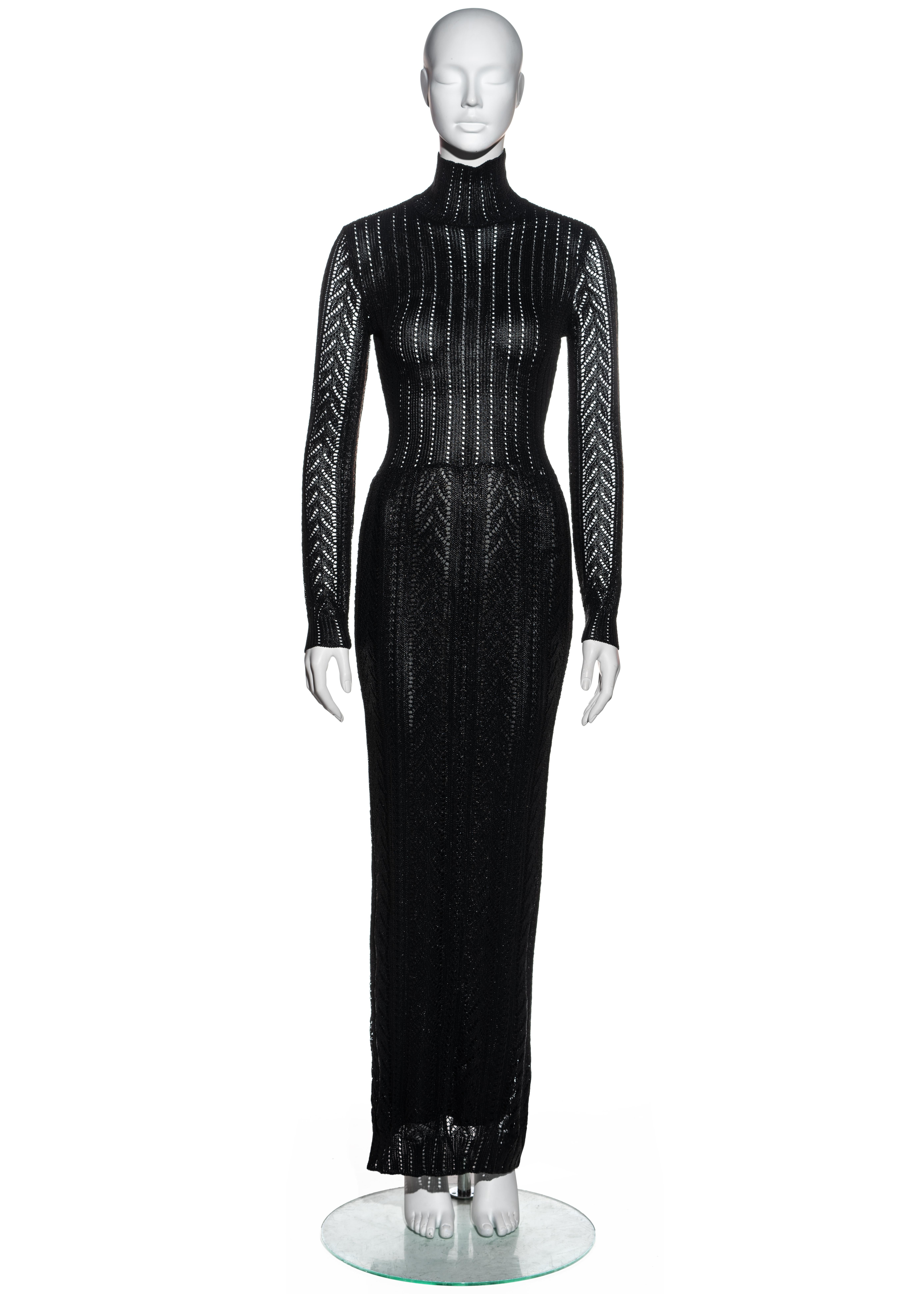 ▪ Christian Dior black metallic crochet knit maxi dress
▪ Designed by John Galliano
▪ Turtle neck 
▪ Lined skirt 
▪ Body conscious fit 
▪ FR 36 - UK 8 - US 4
▪ Fall-Winter 1999
