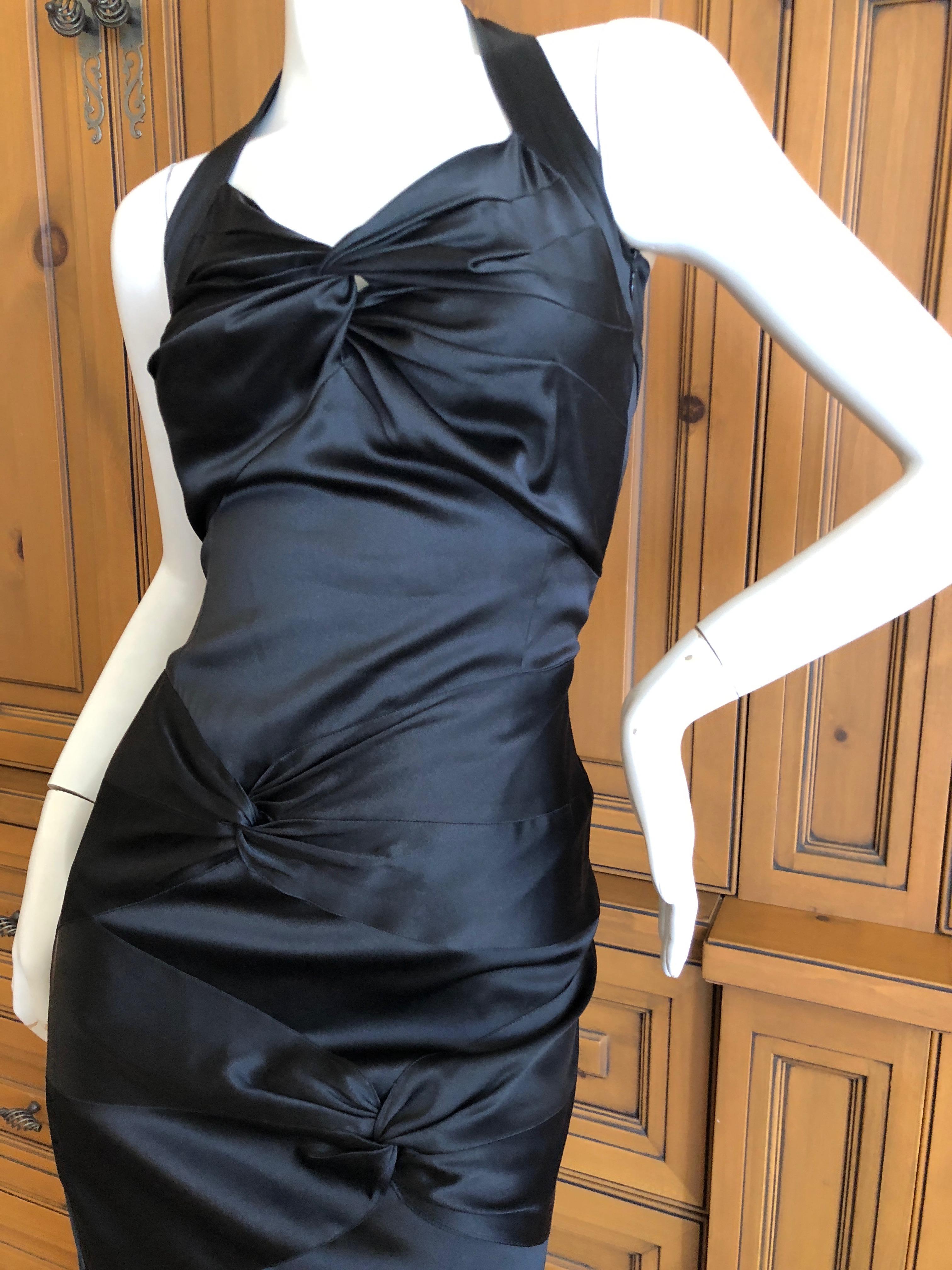 Christian Dior by John Galliano Black Silk Lined Knot Dress.
Acetate with a lot of stretch, lined in silk.
Size 40
Bust 36