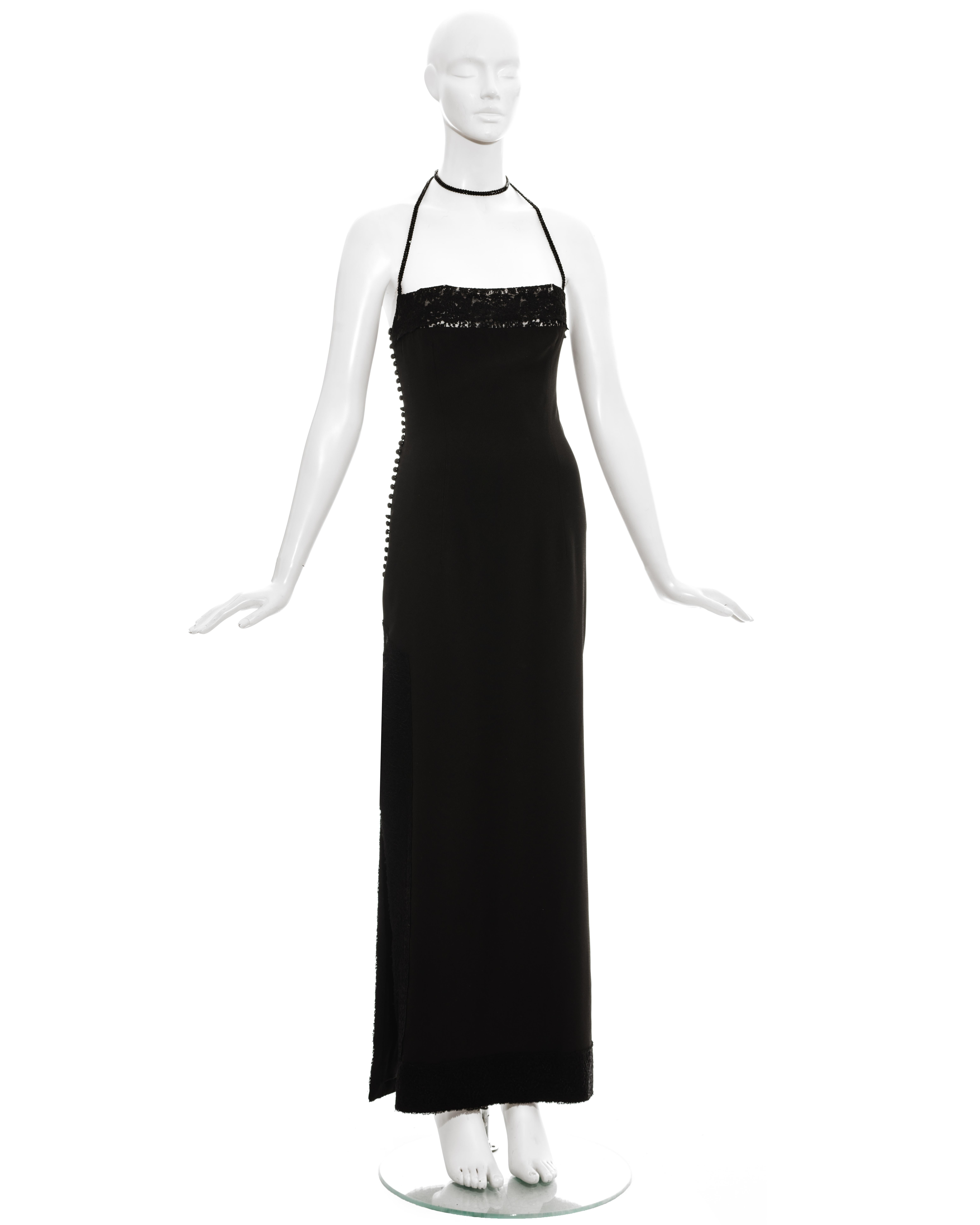 Christian Dior by John Galliano black silk crepe evening dress with high leg slit, lace trim and attached beaded choker necklace. 

Fall-Winter 1997
