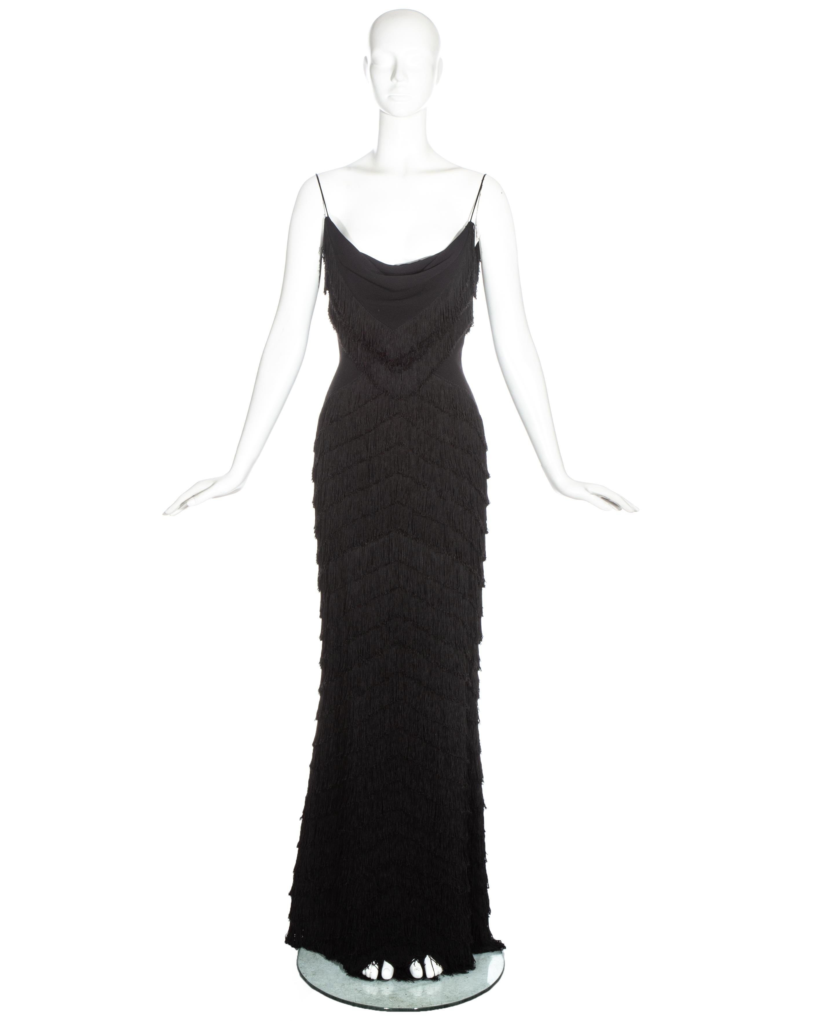Christian Dior by John Galliano black silk fringed evening dress with spaghetti straps and silk lining.

Spring-Summer 1998