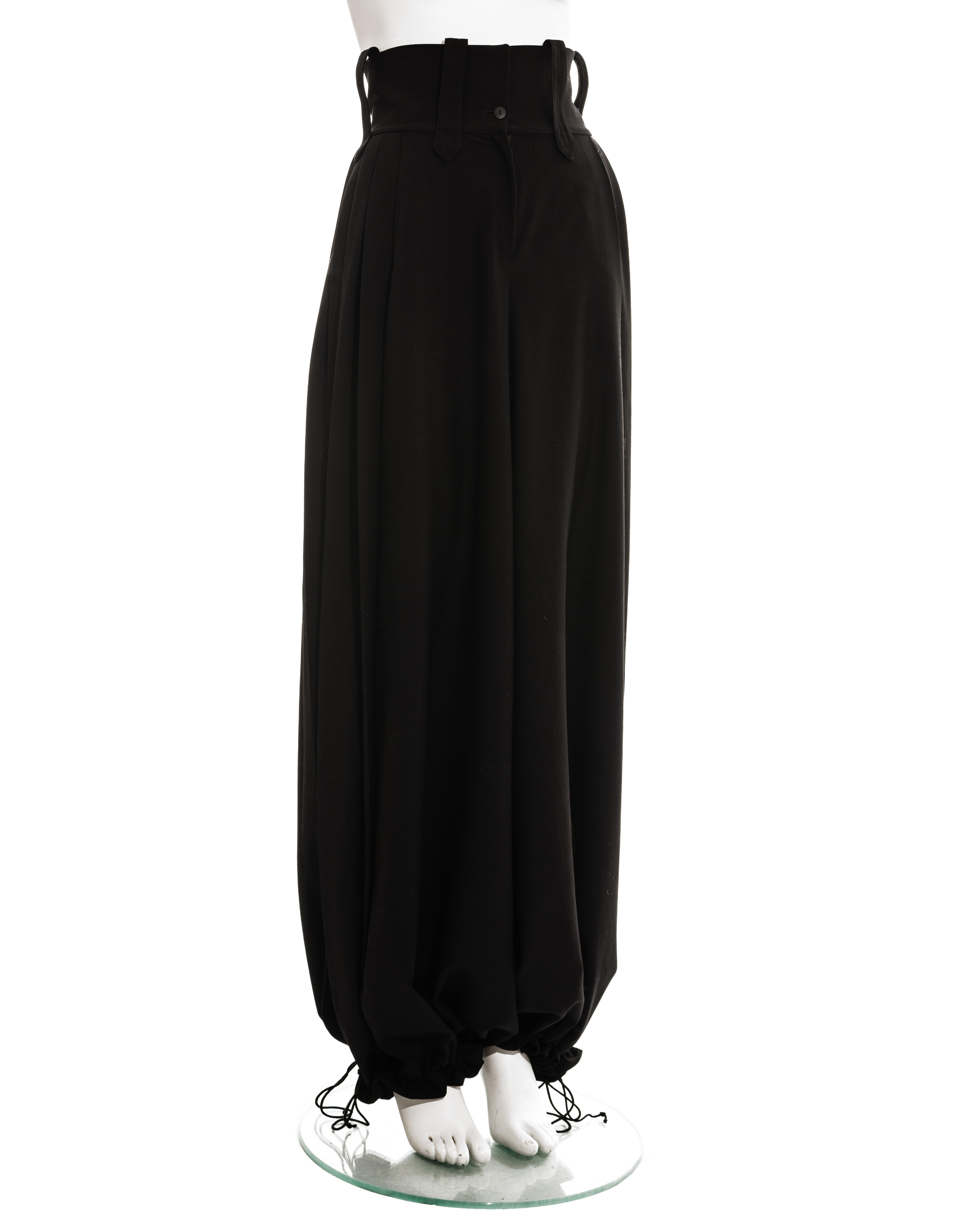 Christian Dior by John Galliano black wool wide leg haram pants with drawstring fastening on ankles and wide waist band.

Spring-Summer 1999