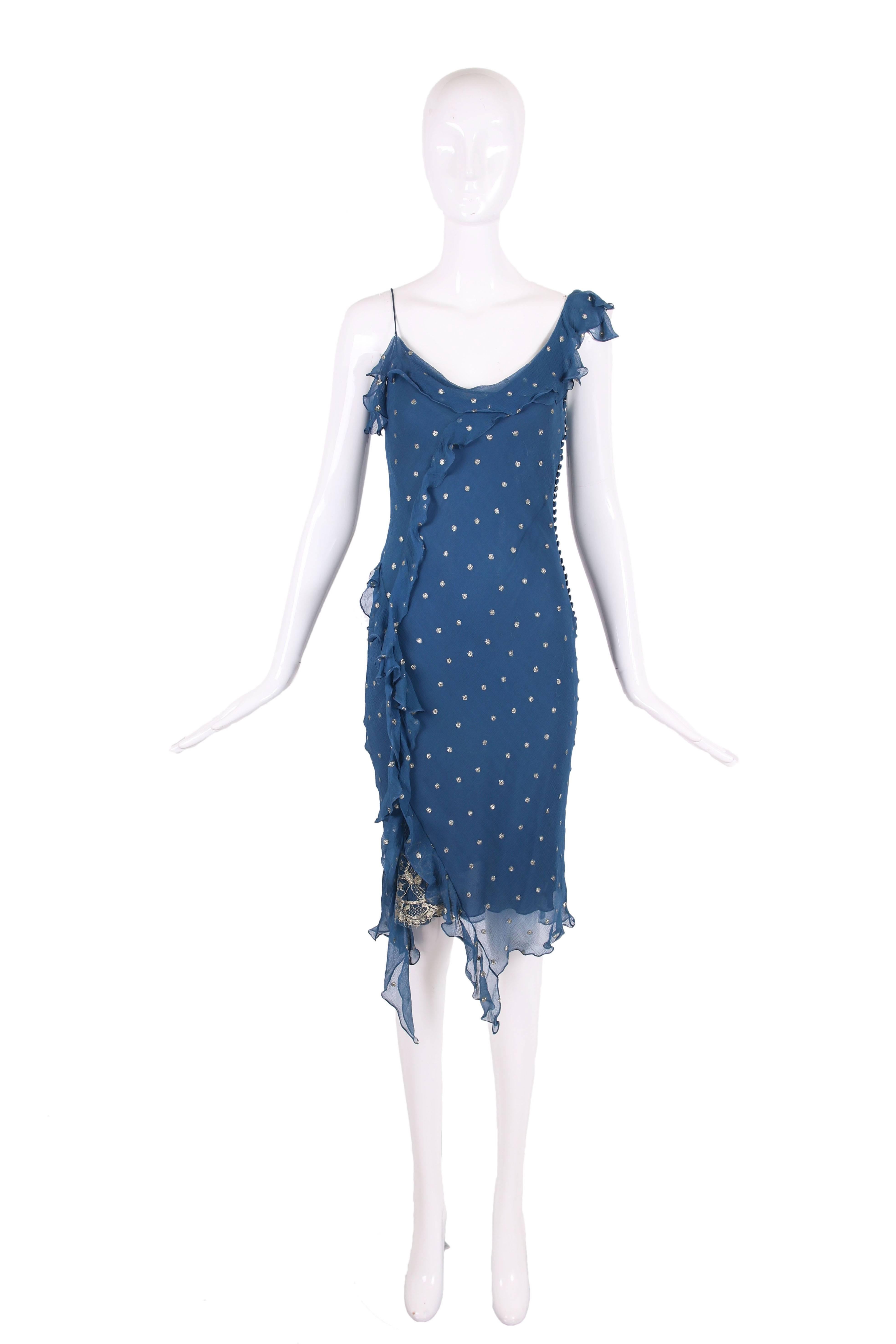 Christian Dior by John Galliano blue silk chiffon bias cut cocktail dress with metallic gold polka dots and a gold metallic lace insert at the side seam hem. There is a blue slip attached underneath. In very good condition with some minor pulls to