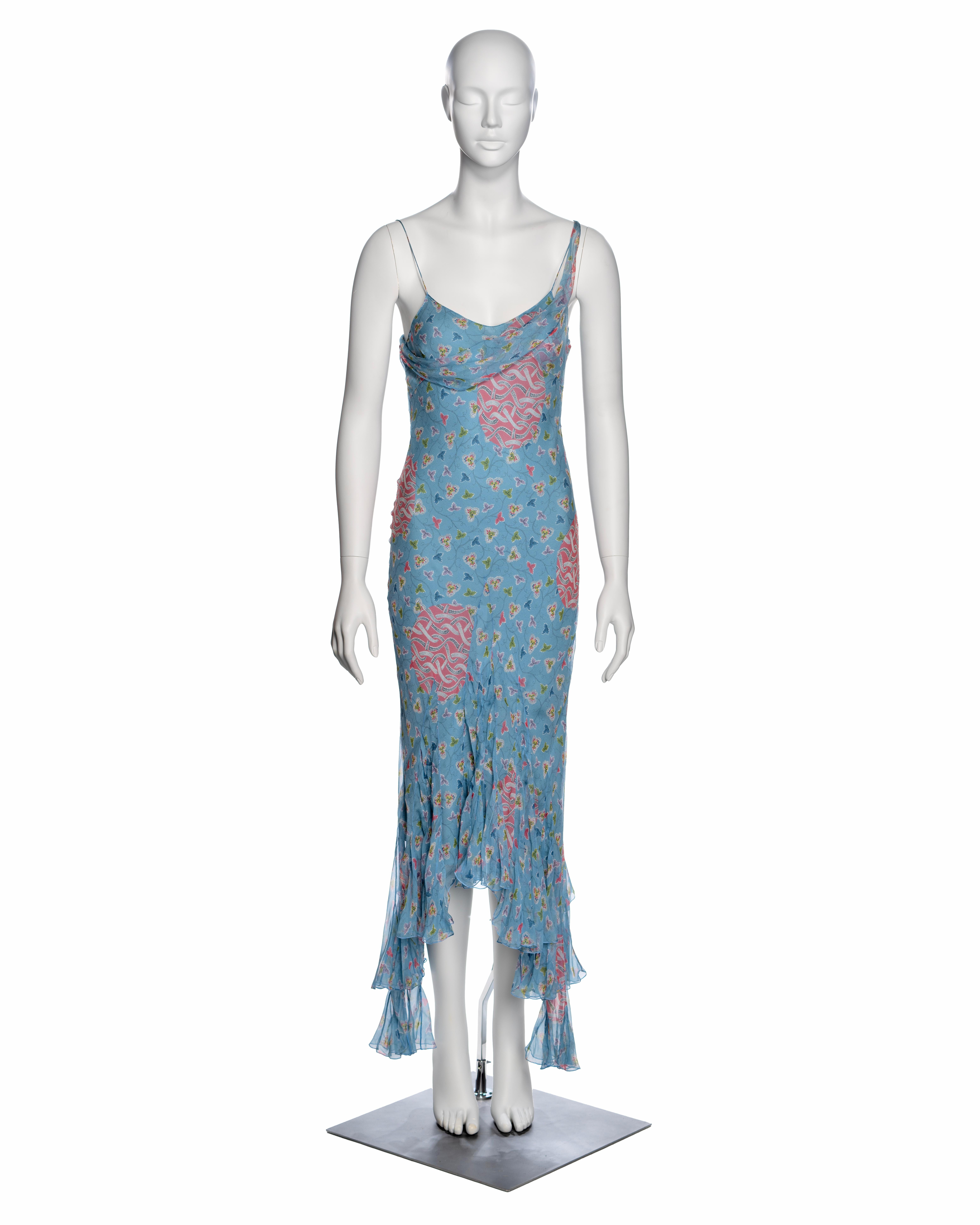 ▪ Brand: Christian Dior
▪ Creative Director: John Galliano
▪ Collection: Spring-Summer 2003
▪ Fabric:  Silk
▪ Details: Constructed from blue silk chiffon adorned with a floral print in shades of pink, purple, and green. It features an asymmetric