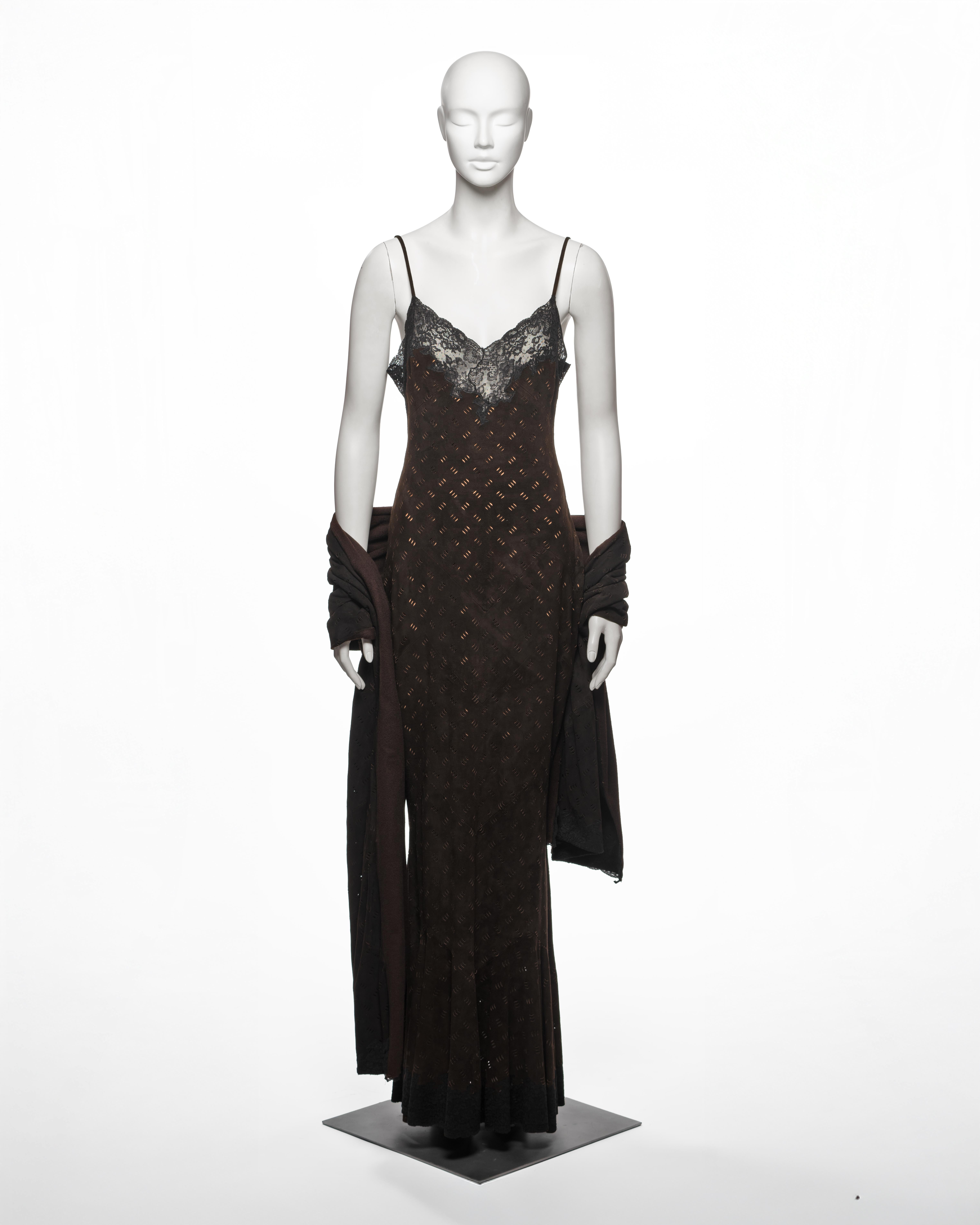 Bias-cut evening slip dress by Christian Dior by John Galliano, from the Fall-Winter 1999 collection. Constructed in dark brown velvet suede with an allover diagonal grid of laser-cut slits revealing the nude silk lining beneath. The neck and