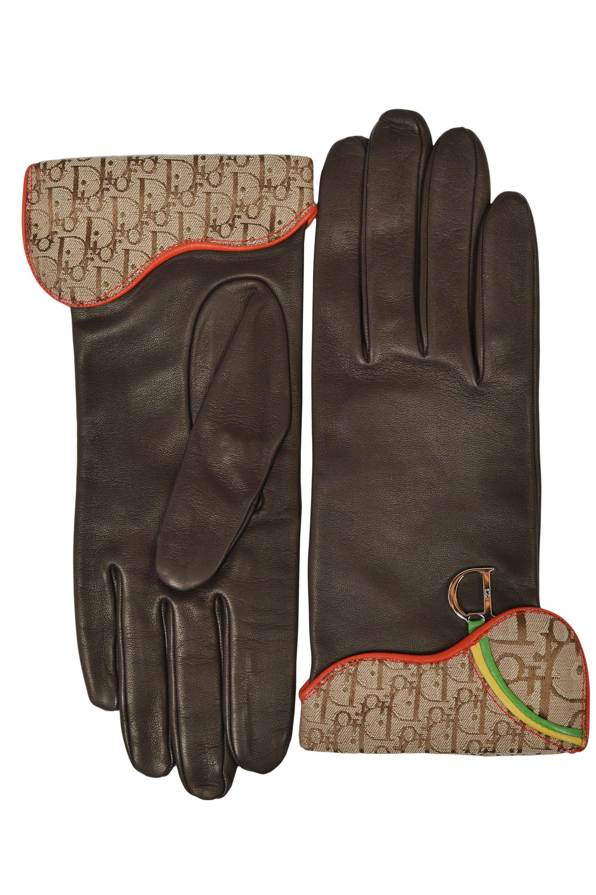 Resurrection Vintage is excited to offer a pair of vintage Christian Dior grown leather gloves with Diorissimo logo fabric, reggae-colored trim, and silver-tone hardware.

Christian Dior Label
Designed By John Galliano
Size US 7.7
Lambskin, Silk