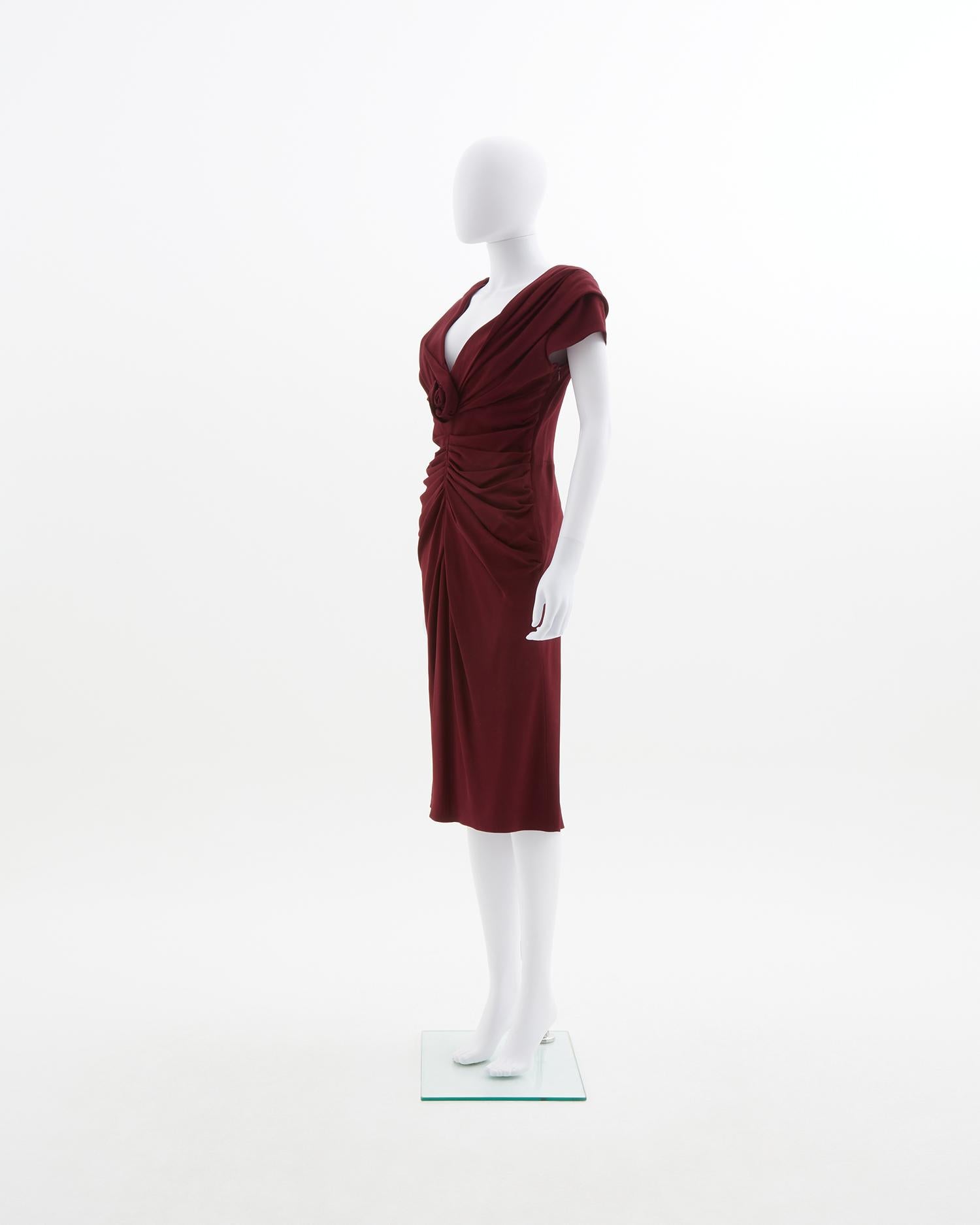 - Designed by John Galliano
- Sold by Skof.Archive
- Cowl neckline
- Above knee-length 
- Hidden side zipper
- Draped bow with rose detail 
- Size label removed 
- Fall Winter 2008

Size:
Aproximate 
FR 38 - IT 42 - UK 10 - US 6 (EU)

Measurements: