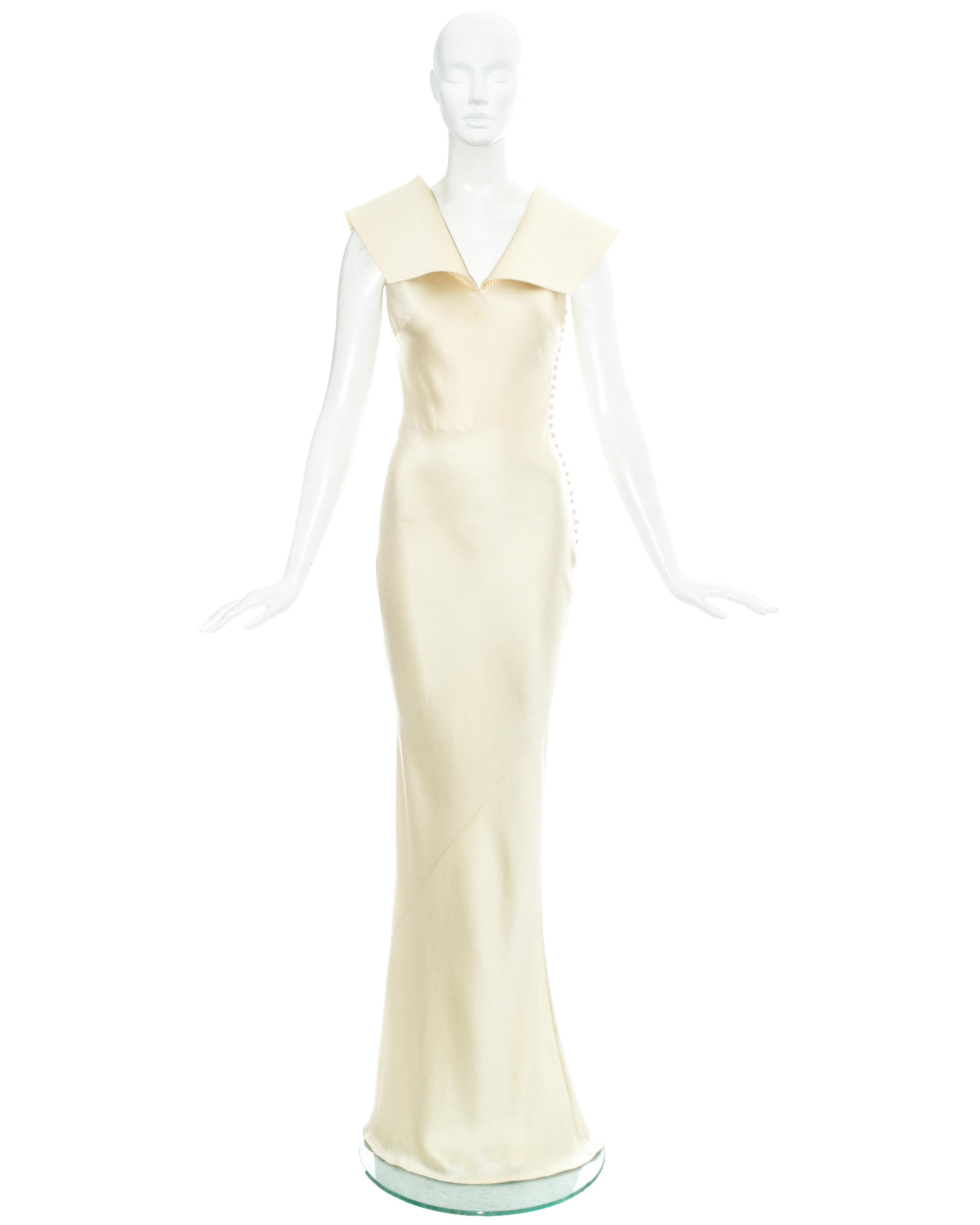 Christian Dior by John Galliano champagne silk evening dress with structured collar and fabric button fastenings on side seam

Fall-Winter 1999