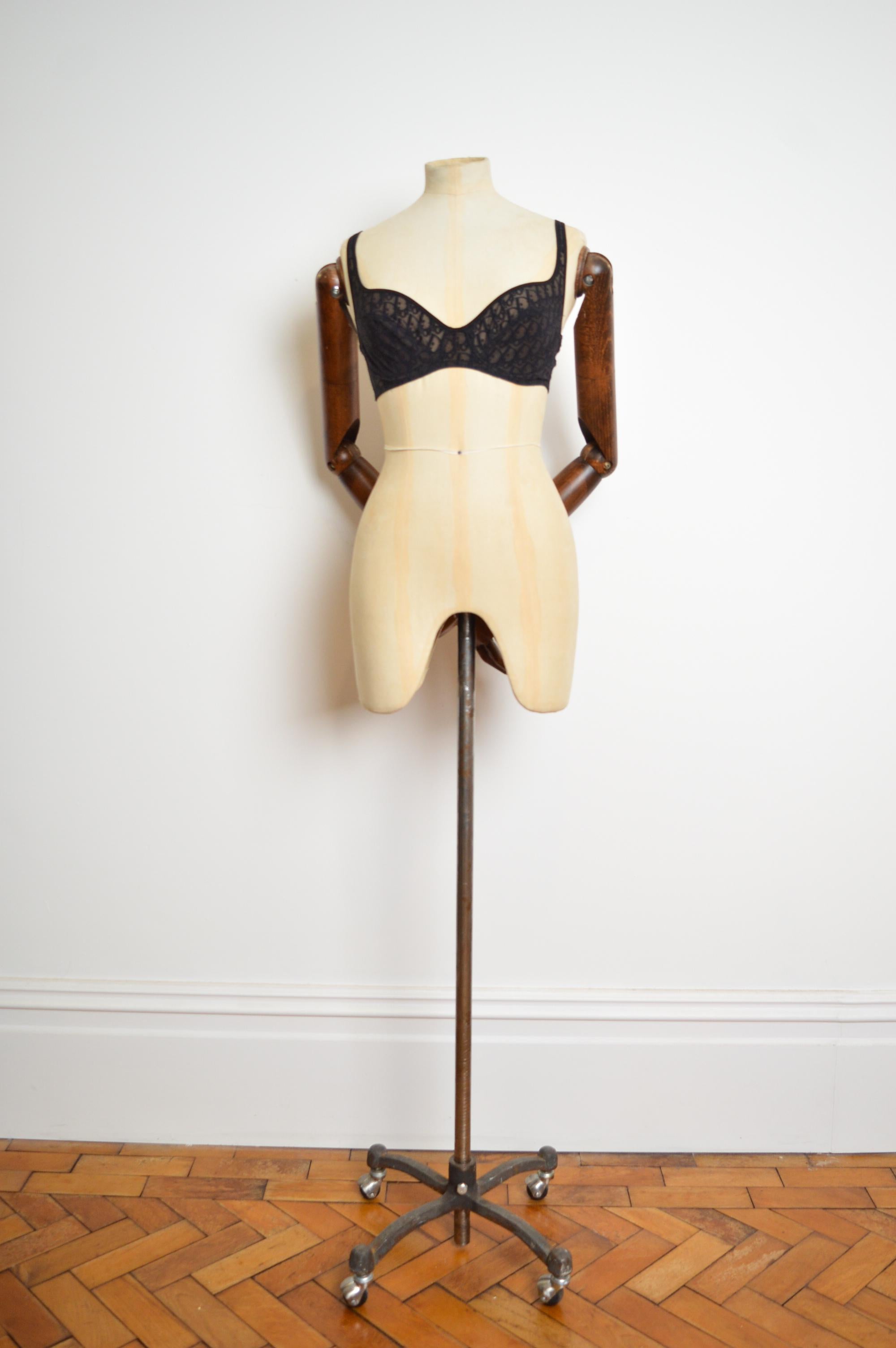 This Rare and Iconic Christian Dior monogram Bra designed by John Galliano is crafted from a simple sheer black Dior 'trotter' lace, with fully adjustable shoulder straps, stretchy elasticated band under the bust, farrier hook fasten closure. 