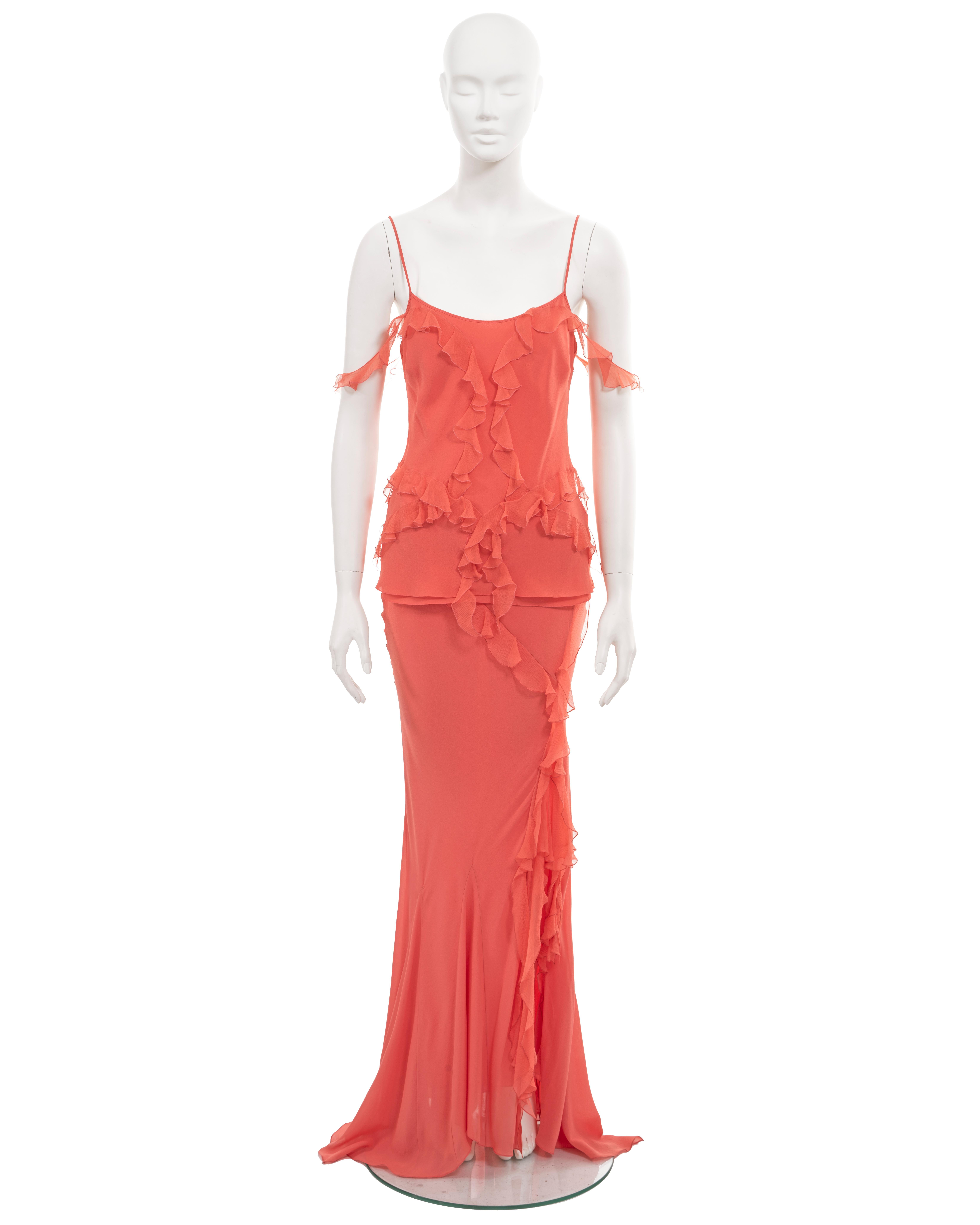 ▪ Christian Dior evening skirt and top set
▪ Creative Director: John Galliano
▪ Sold by One of a Kind Archive
▪ Fall-Winter 2004
▪ Coral silk chiffon 
▪ Ruffled trimmings 
▪ Spaghetti strap vest top with two off-shoulder straps 
▪ Floor-length skirt
