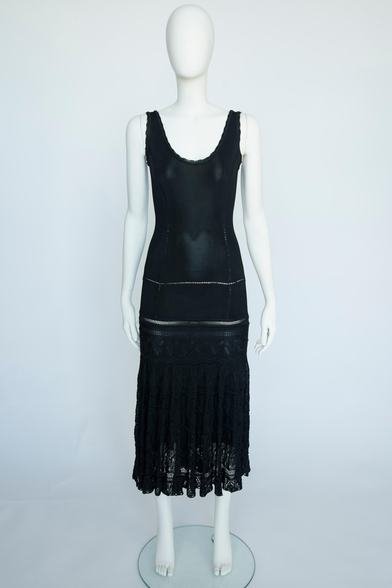 Dating back to John Galliano's for Christian Dior epic Spring-Summer 1998 collection, this maxi style has been crochet-knitted, showing some skin in all of the right places. The dress features a low scoop neck (front and back) and a slim-fitting