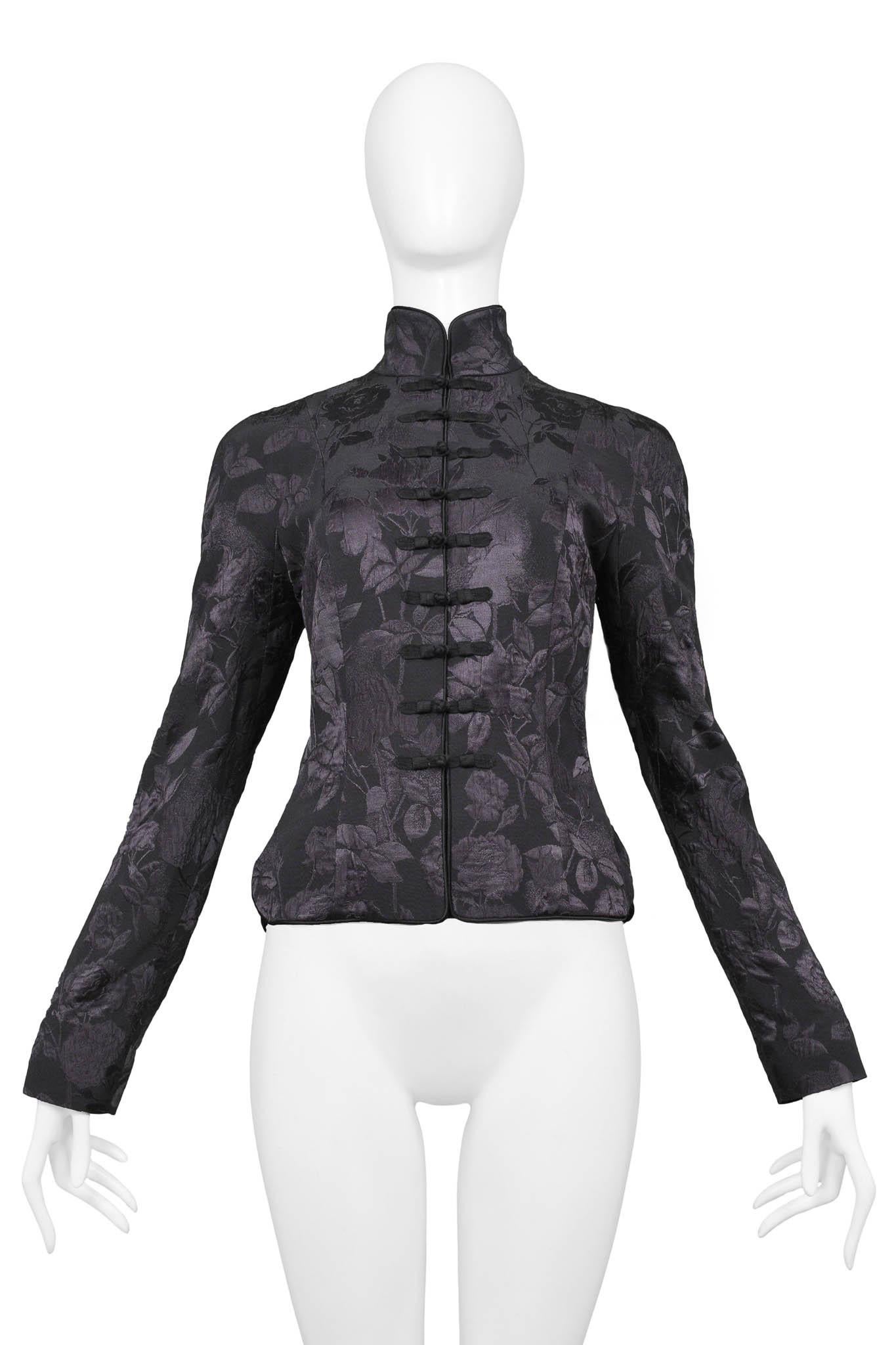 Resurrection is excited to offer a vintage Christian Dior by John Galliano dark purple cheongsam jacket featuring floral patterned silk, a mandarin collar, and front toggle fasteners as the closures. 

Christian Dior Paris
Designed by John