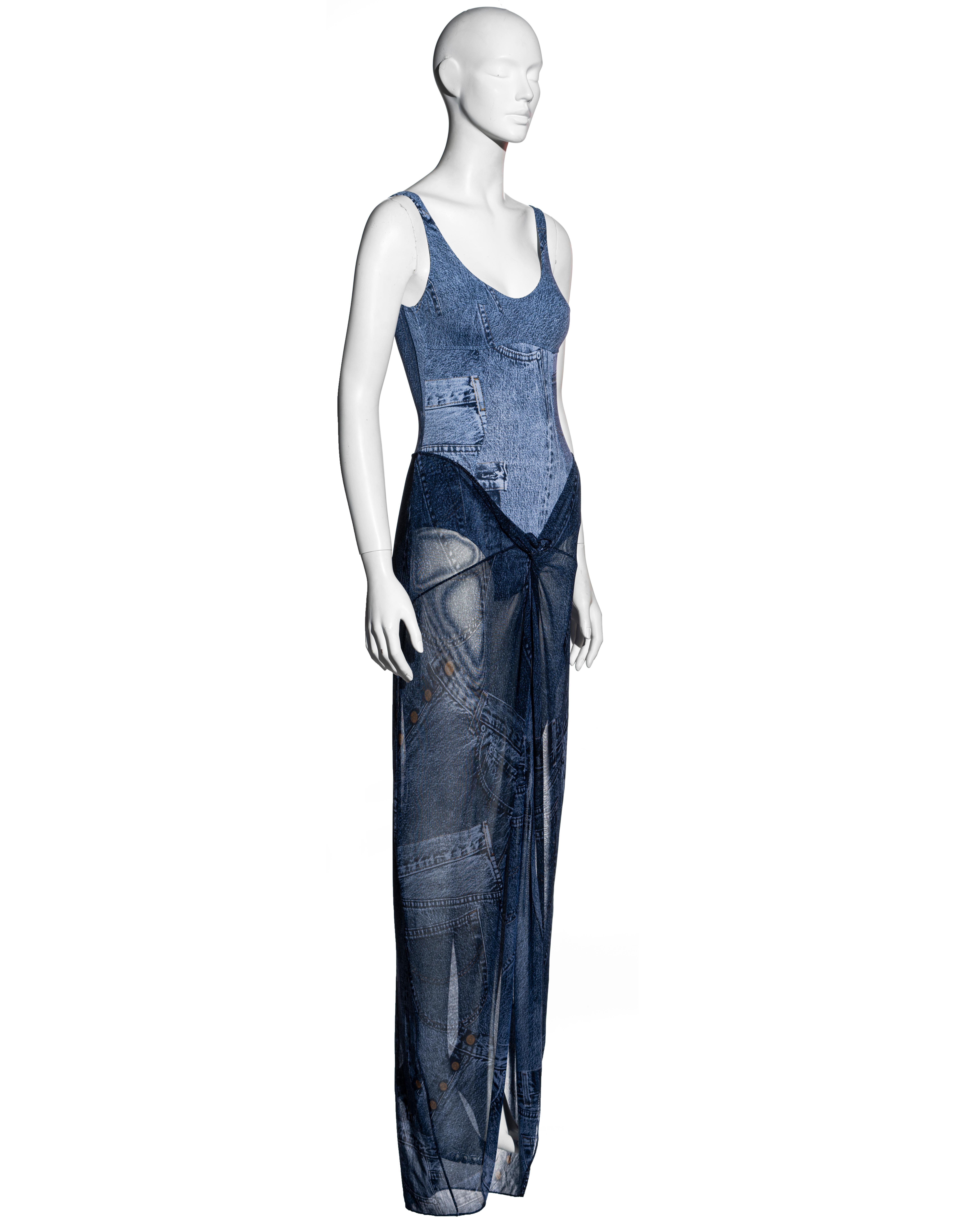 ▪ Christian Dior Trompe-l'œil denim printed bodysuit and maxi skirt set
▪ Designed by John Galliano
▪ Lycra bodysuit with gold 'CD' hardware
▪ Sarong style maxi skirt with knot detail at center-front 
▪ FR 36 - UK 8 
▪ Spring-Summer 2002