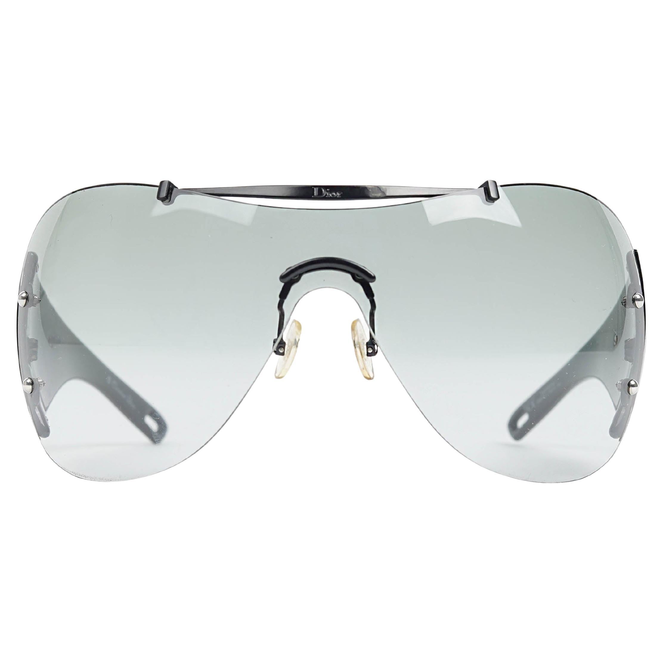 A bold futuristic statement from the early 2000s, these Christian Dior “Diorito 1” shield sunglasses were designed under the creative direction of John Galliano, during one of the house’s most influential eras. With their sleek, wraparound visor