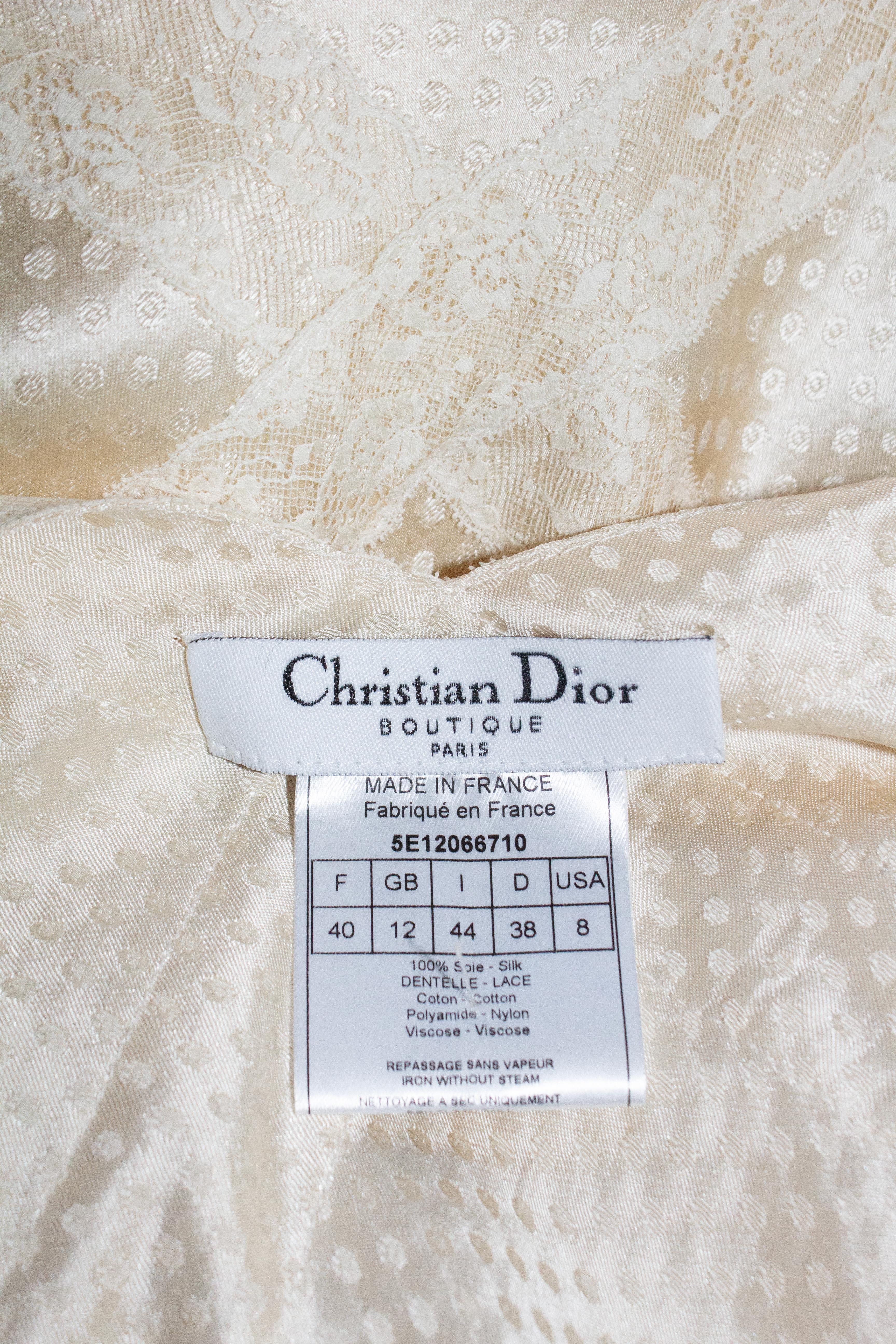 Christian Dior by John Galliano maxi dress, from the Spring/Summer 2005 collection. As seen on the runway. Ivory coloured polka dot patterned silk, with chiffon and lace trims. Would make an exquisite wedding dress.

Condition
Excellent

Marked