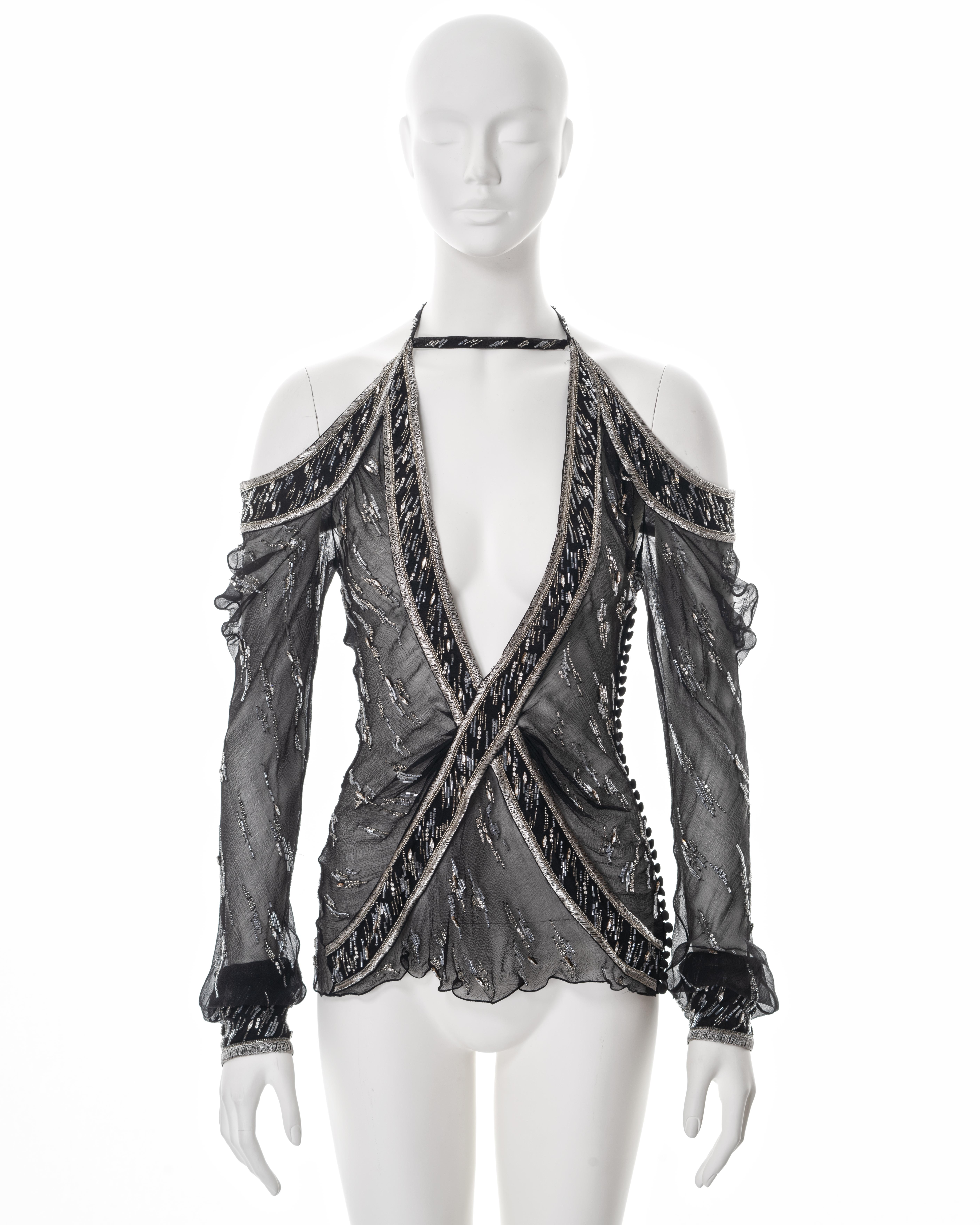 ▪ Christian Dior evening blouse
▪ Creative Director: John Galliano
▪ Sold by One of a Kind Archive
▪ Spring-Summer 2005
▪ Constructed from black bias-cut silk chiffon 
▪ Embellished with glass beads 
▪ Metallic silver metal thread embroidery 
▪