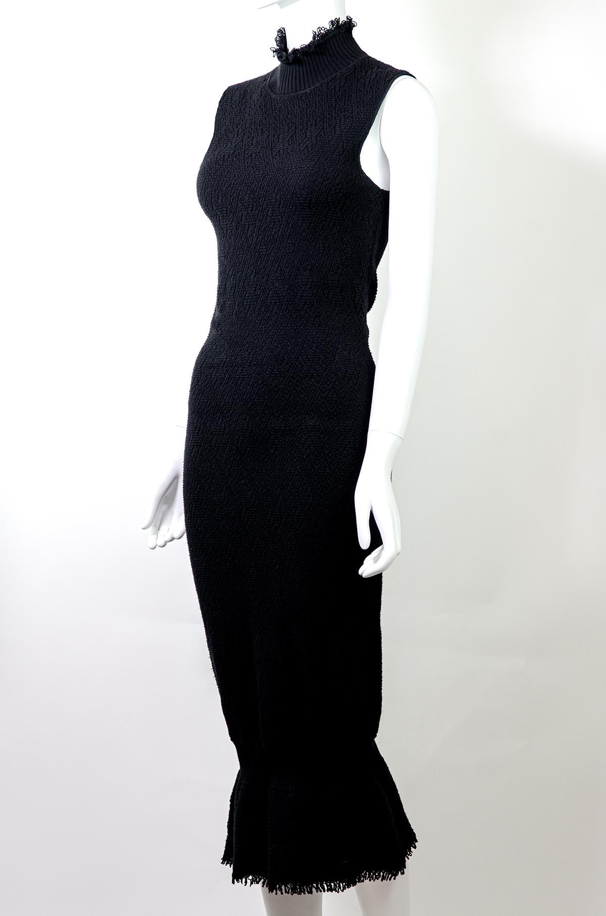 Dior by John Galliano Textured Knit Dress
Brand: Dior
Designer: John Galliano
Collection: Fall / Winter 1999
Fabric: 80% Wool / 15% Viscose / 5% Polyester
Color: Black
Size:  FR40

John Galliano’s creativity is unmatched. His designs for Dior and