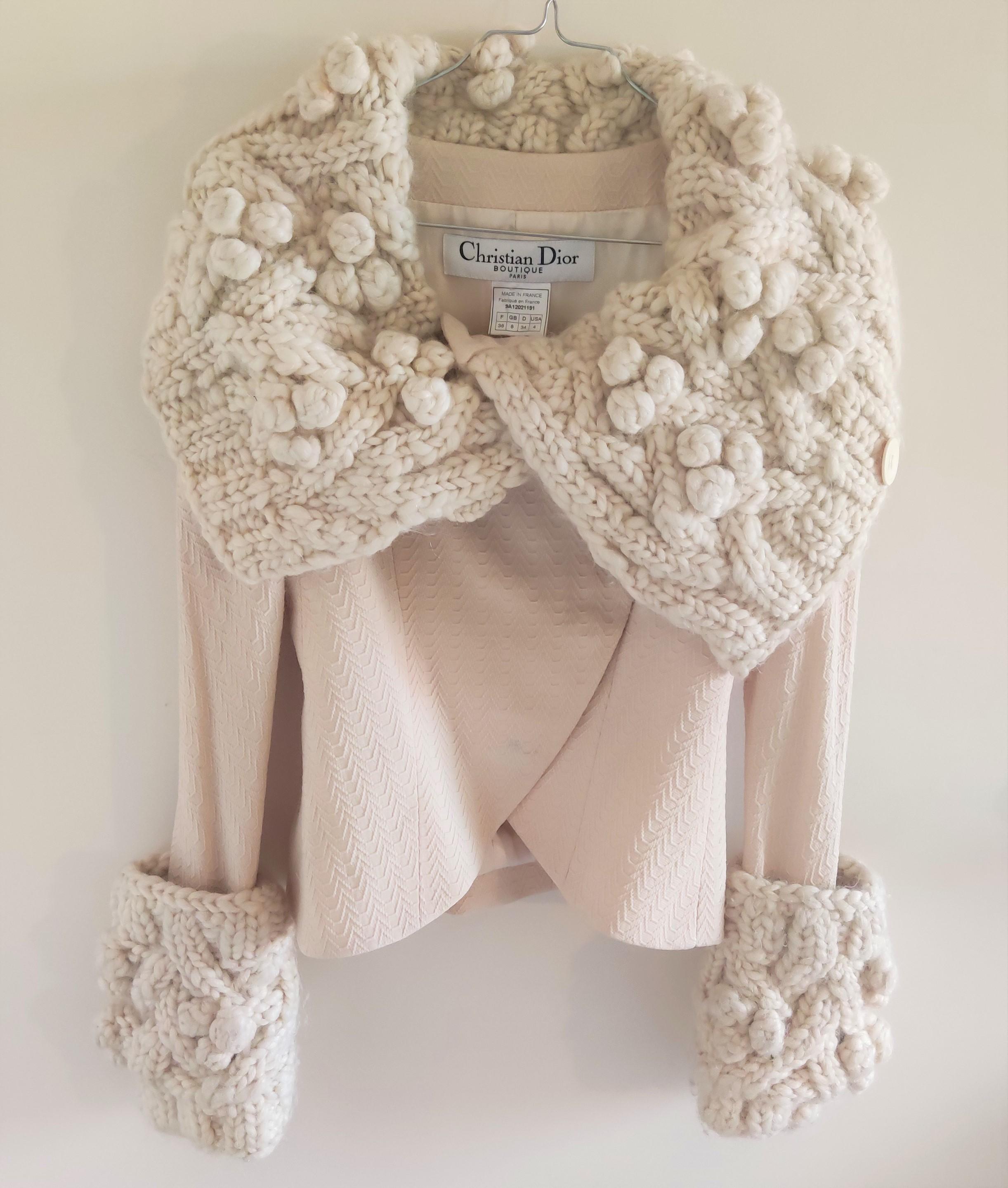 John Galliano for Christian Dior soft cream ivory cashmere & wool jacket from the Dior collection F/W 1999. The jacket adorned with a chunky collar and cuffs is both knitted and crocheted. Jacket has tailored princess seaming.

Condition: Very good